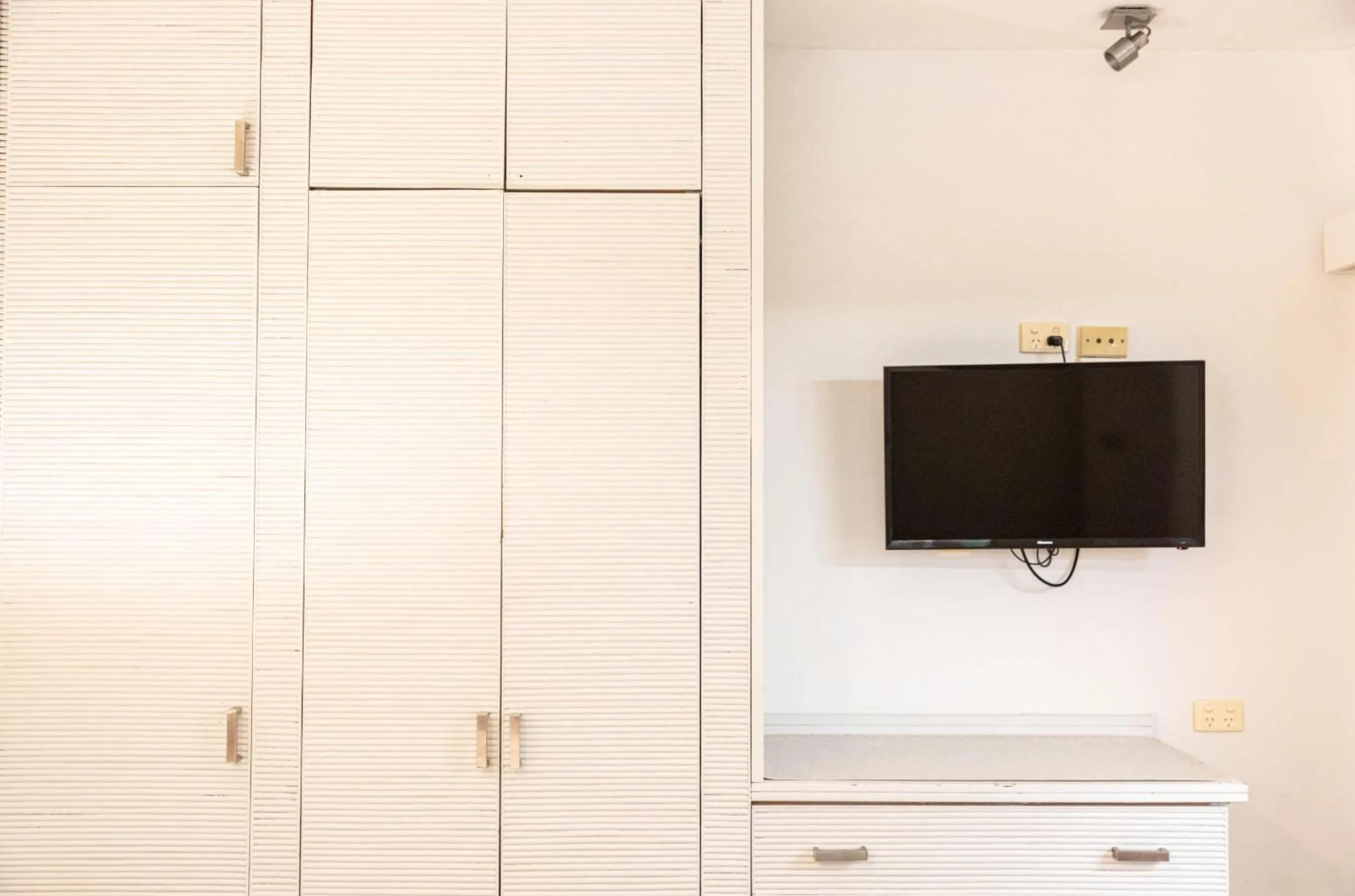 TV and multimedia in Club Tropical Resort - Official Onsite Reception & Check In