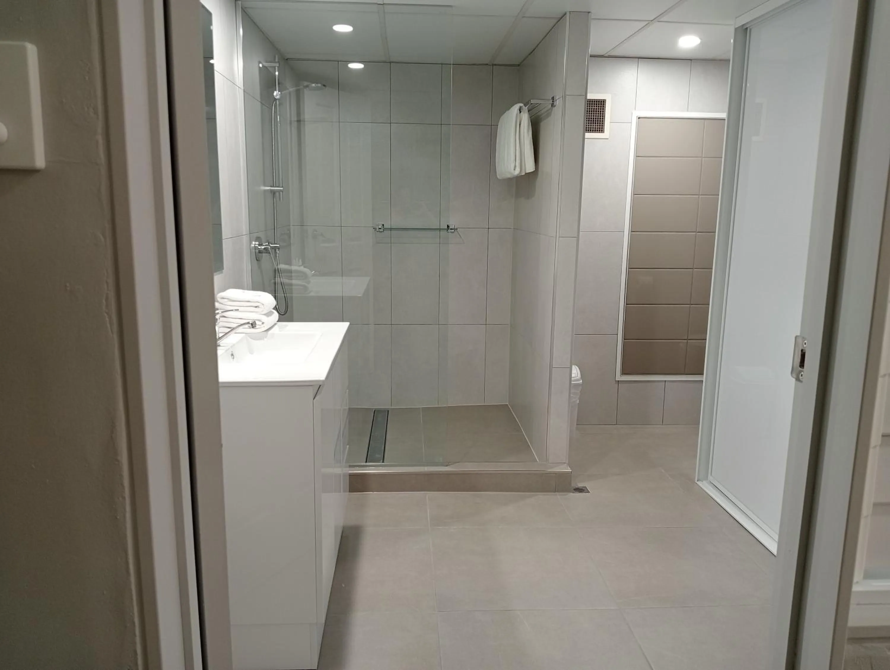 Shower in Club Tropical Resort - Official Onsite Reception & Check In