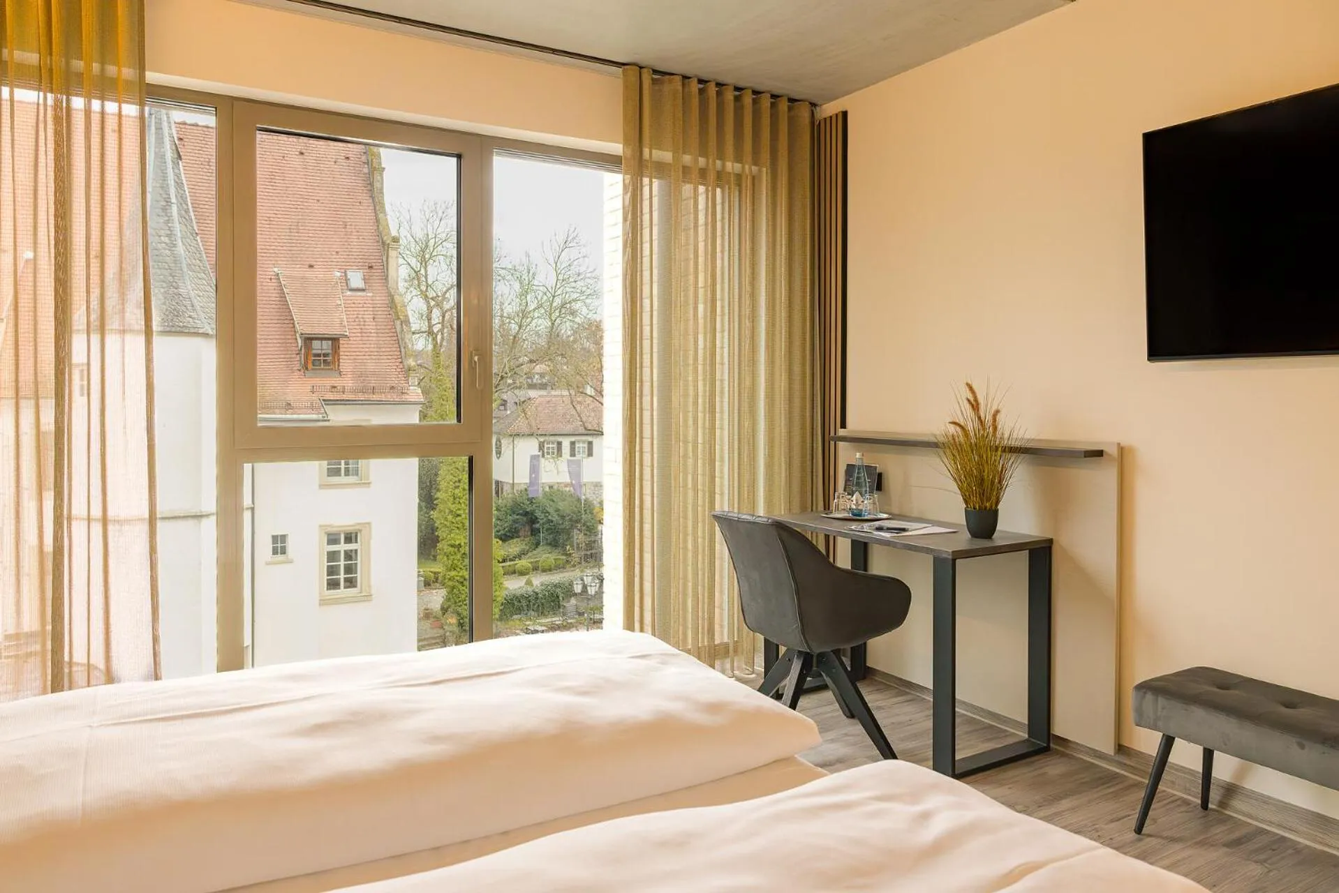 View (from property/room), Bed in Hotel Schloss Lehen