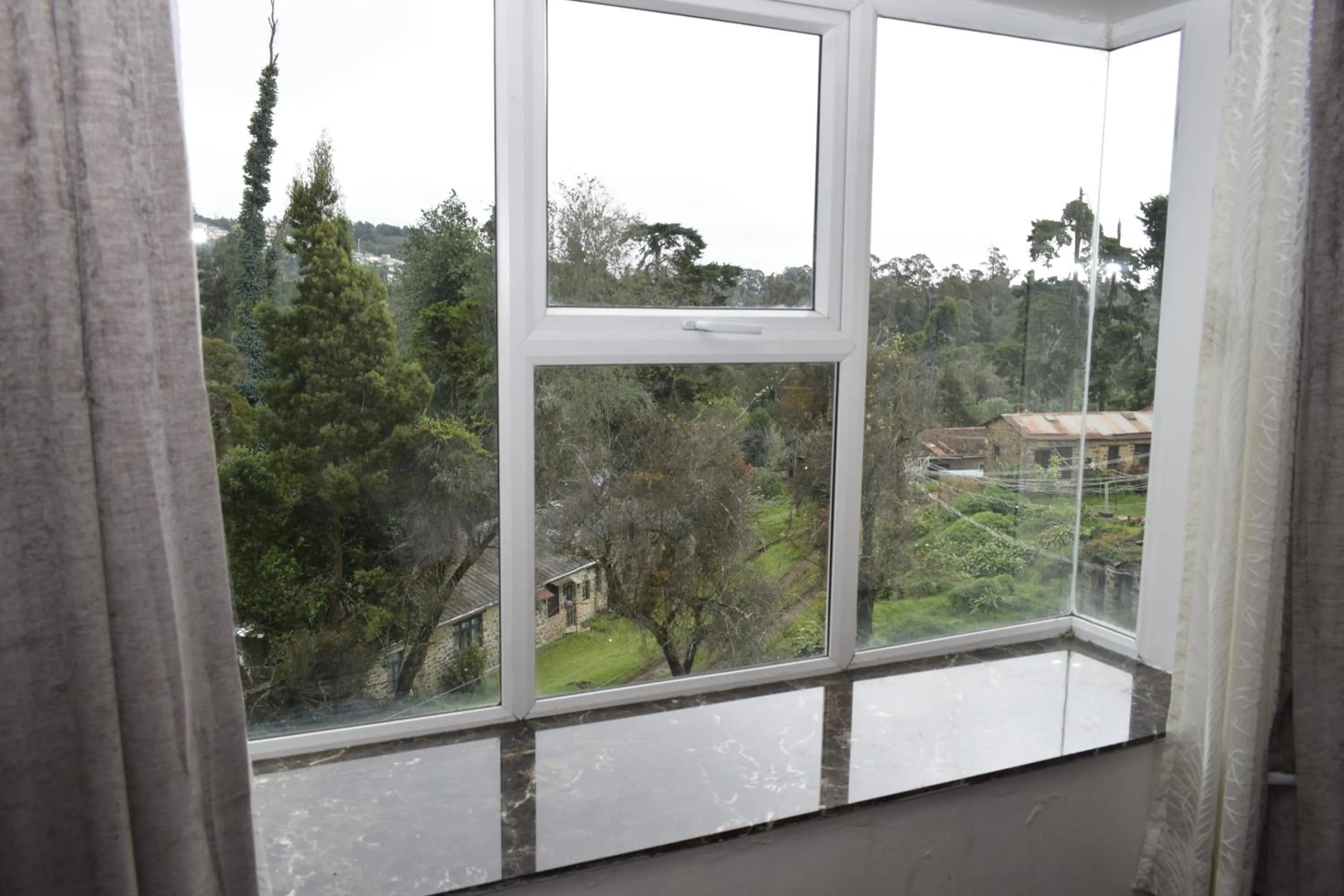 Garden view in The Hamuse Hotel Kodaikanal - Luxury Redefined