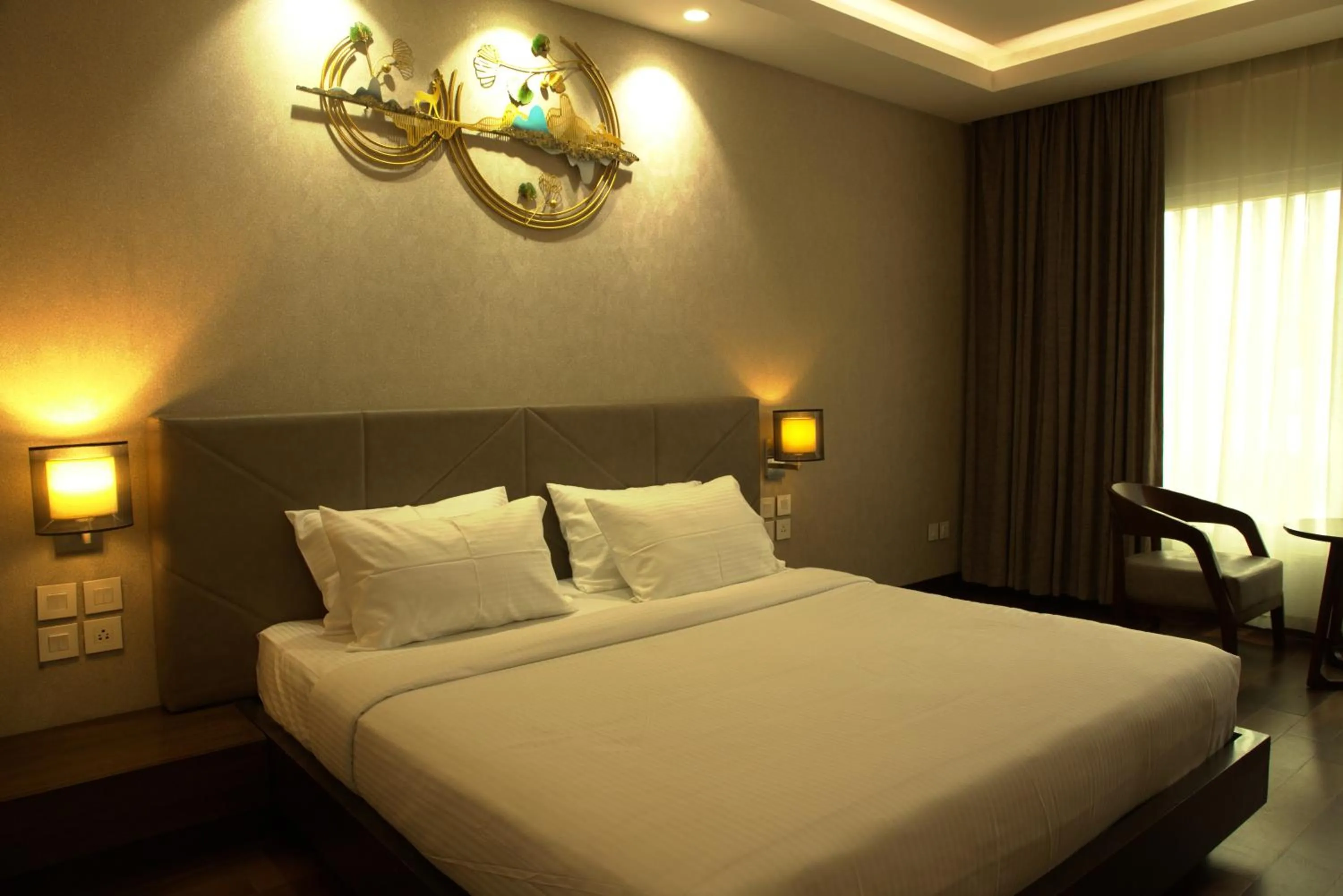 Living room, Bed in The Hamuse Hotel Kodaikanal - Luxury Redefined