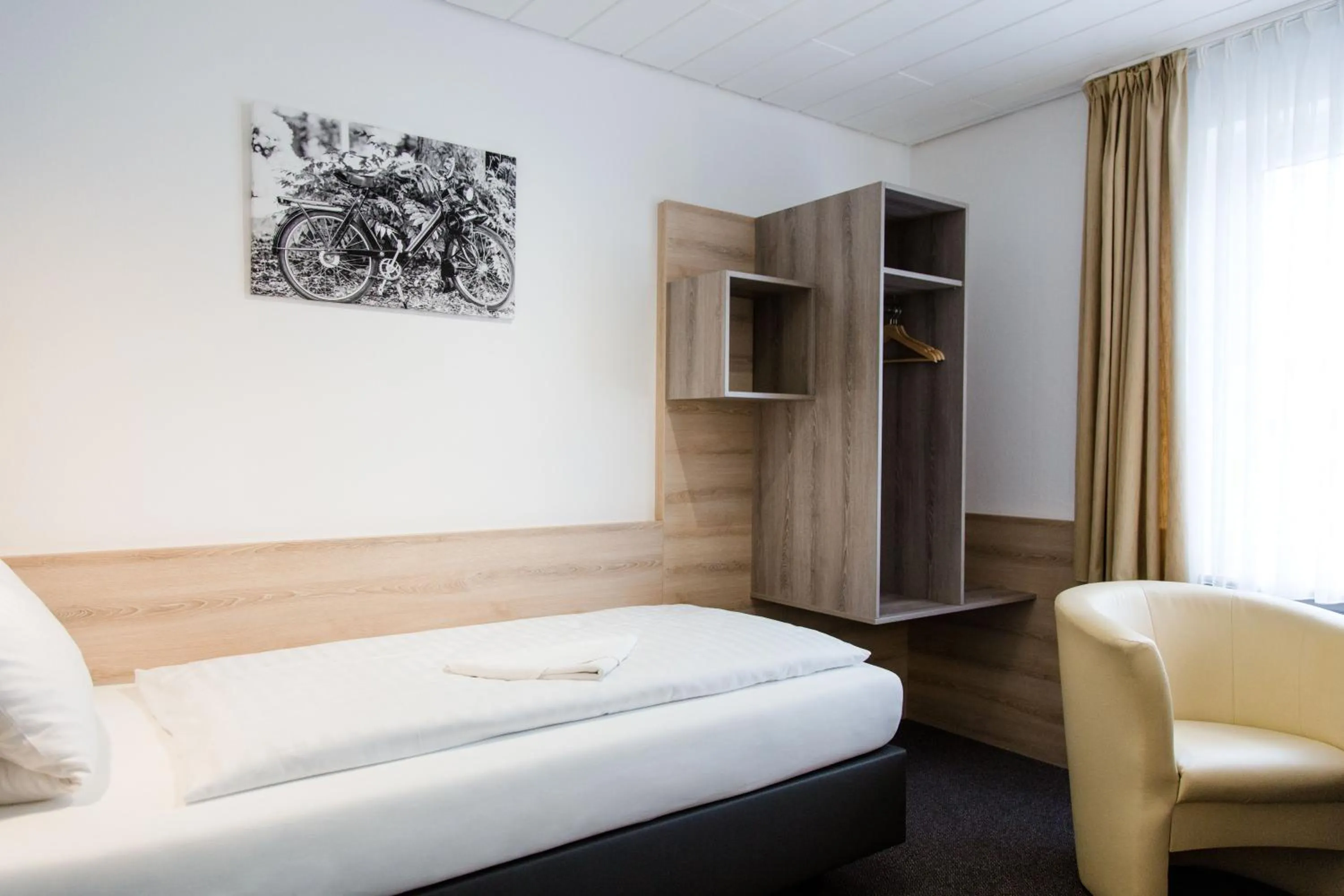 Bed in Friesen Hotel