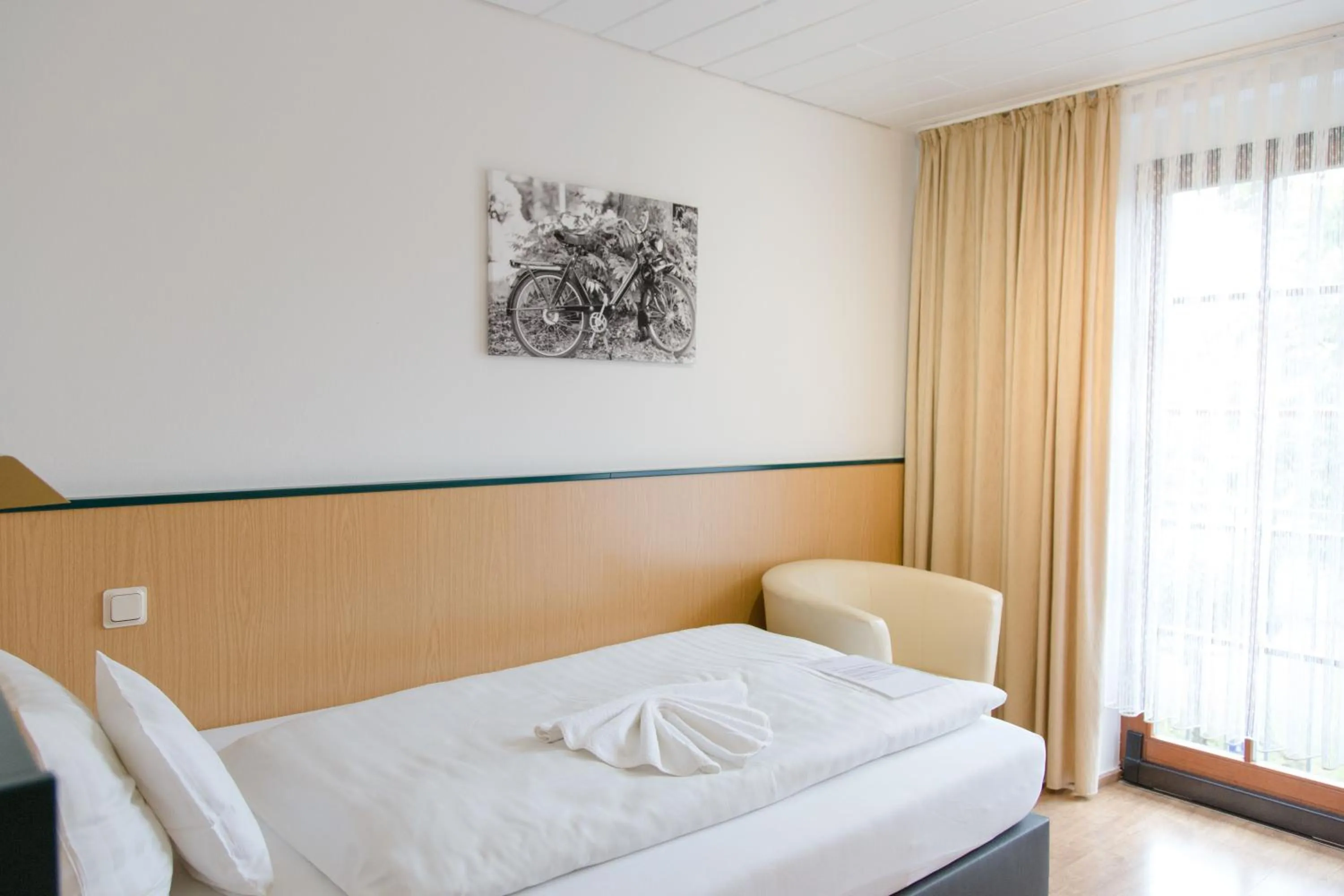 Bed in Friesen Hotel