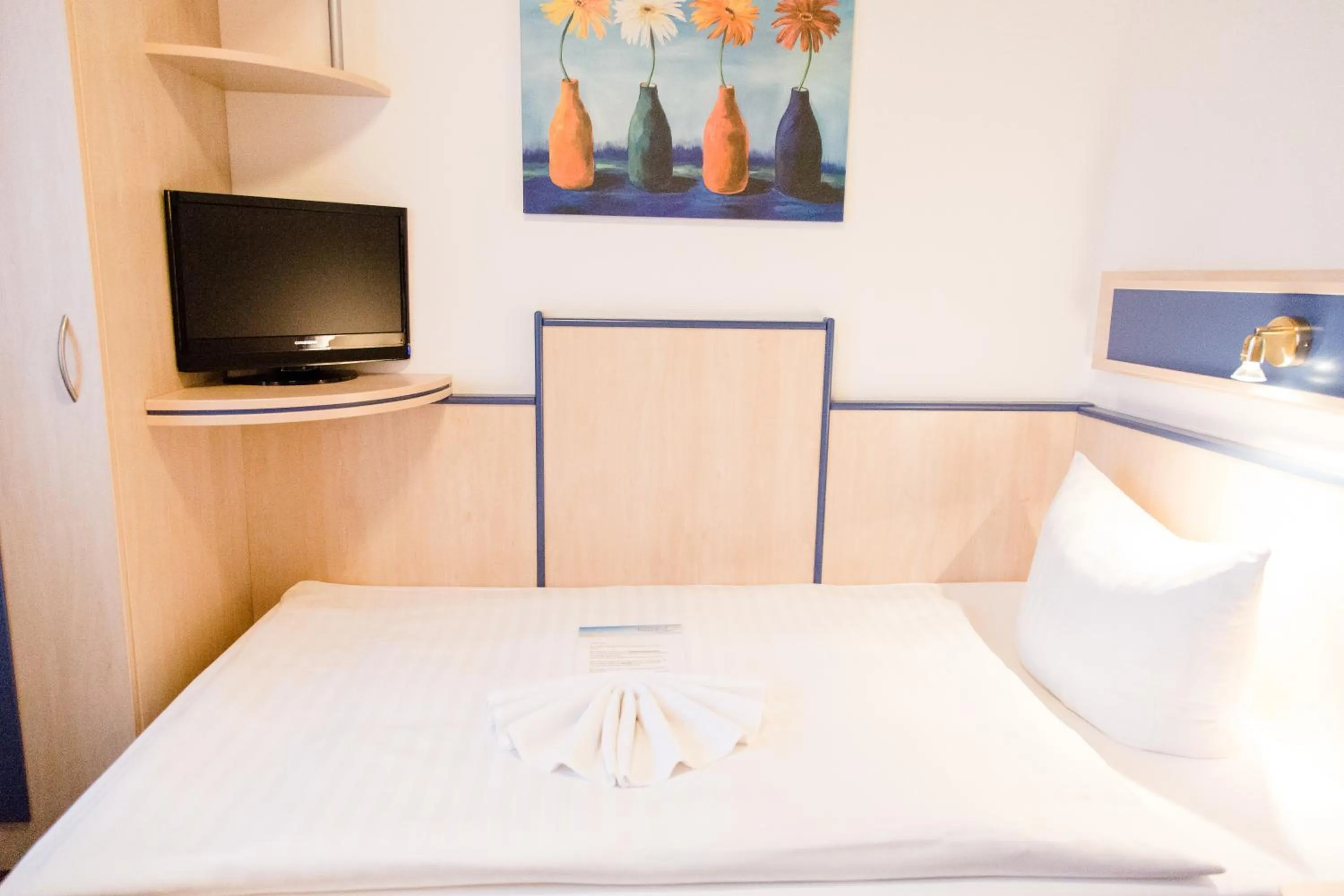 Bed in Friesen Hotel