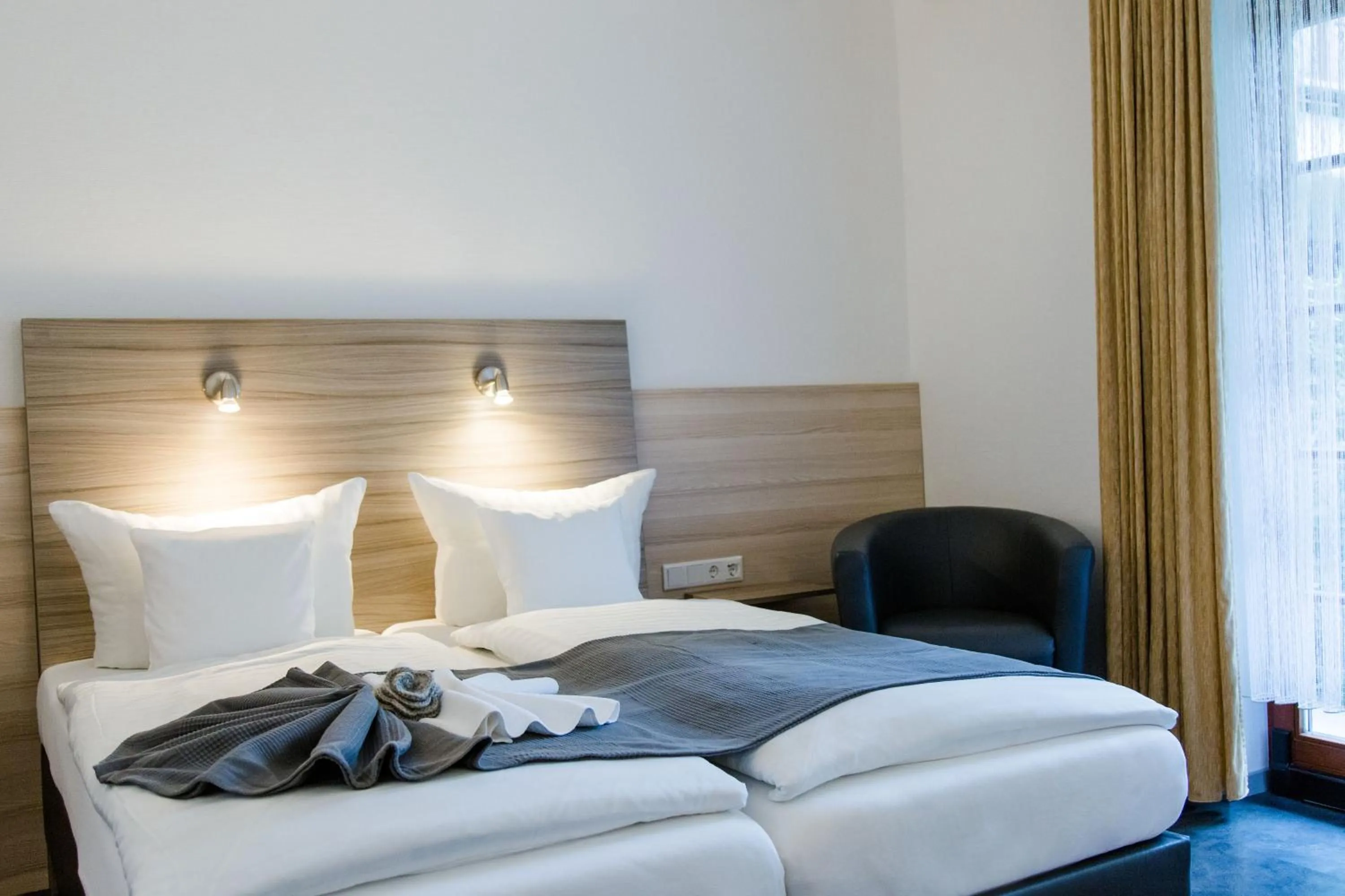 Bed in Friesen Hotel