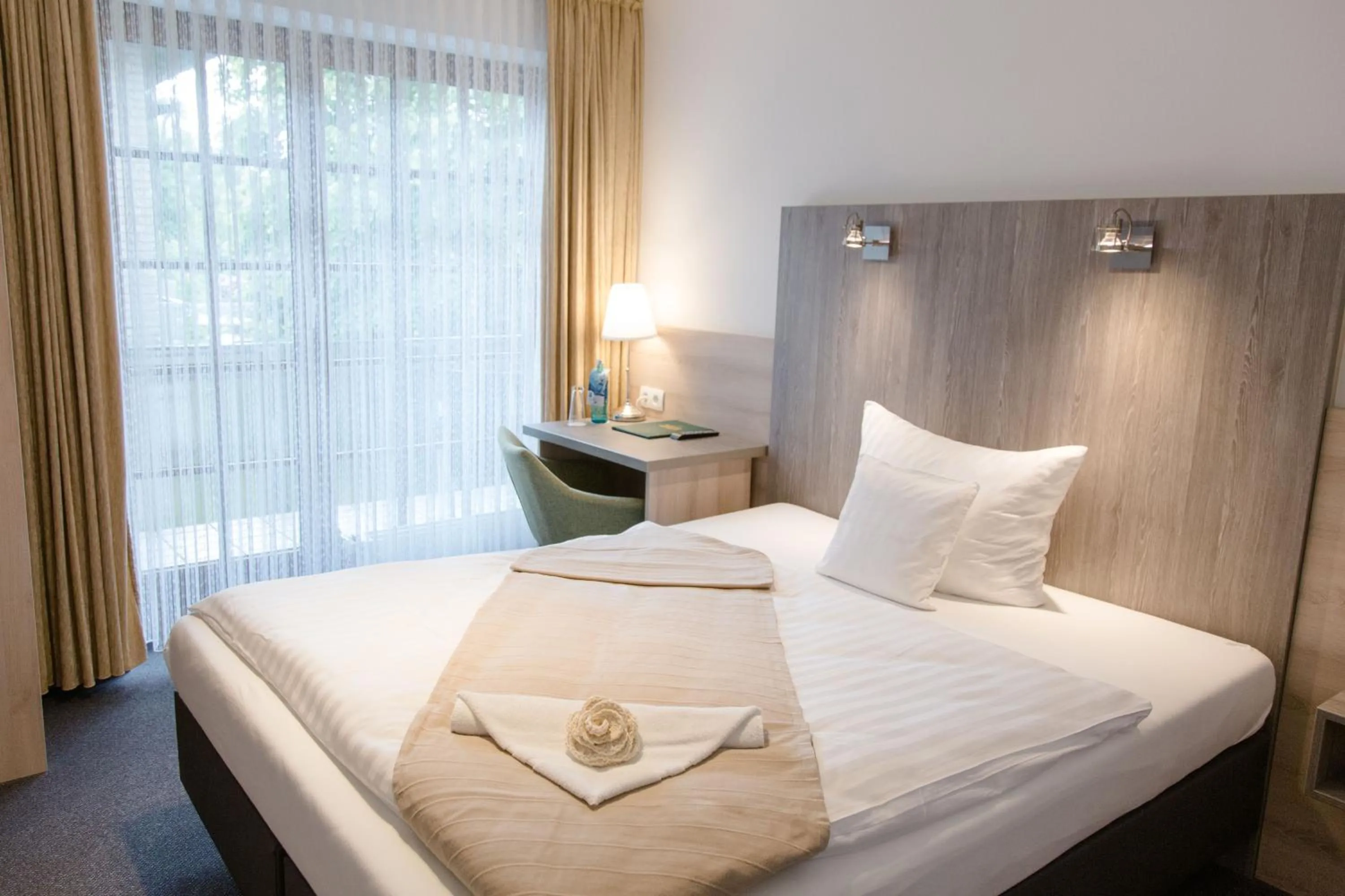 Bed in Friesen Hotel