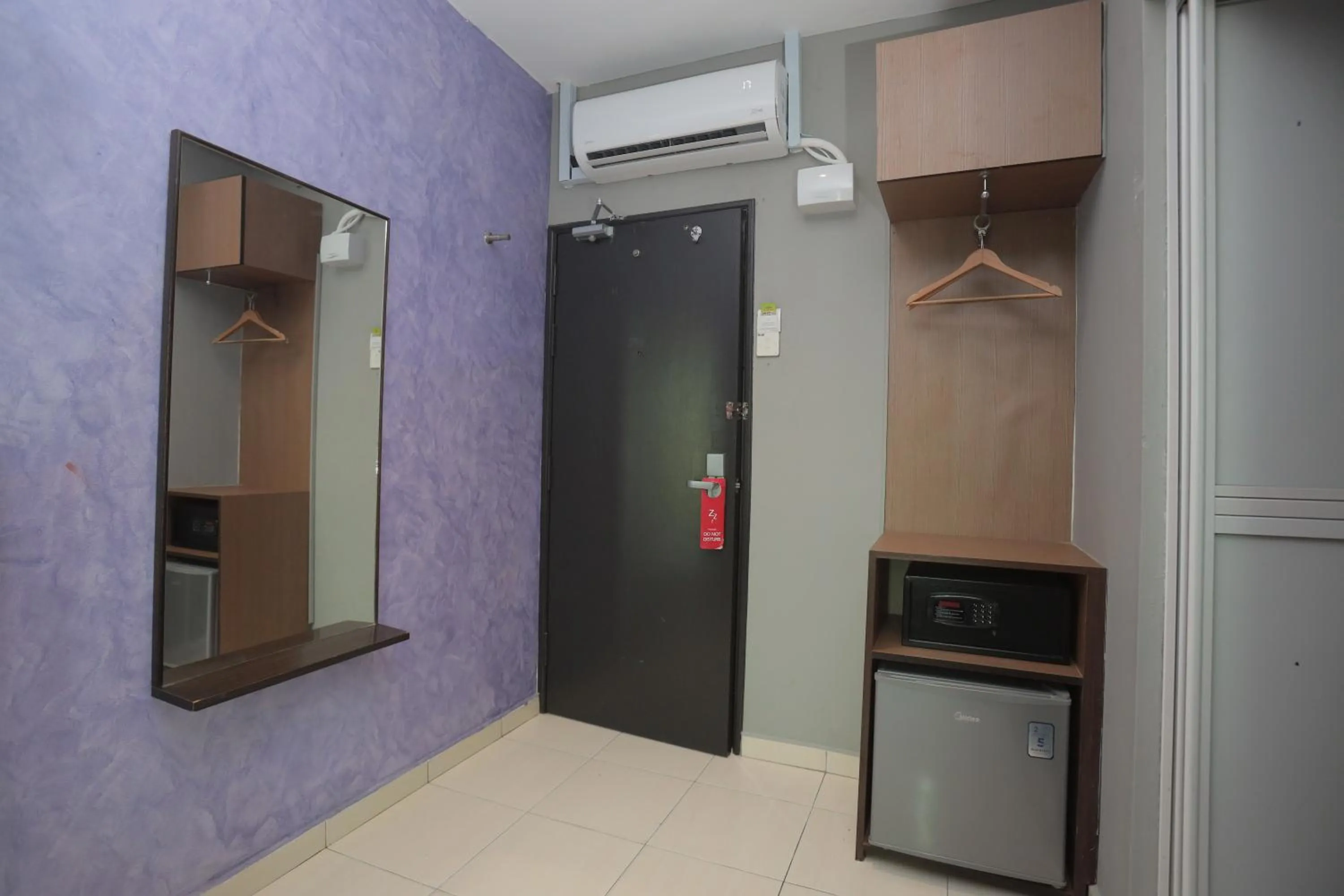 Bedroom in DJ Citi Point Hotel