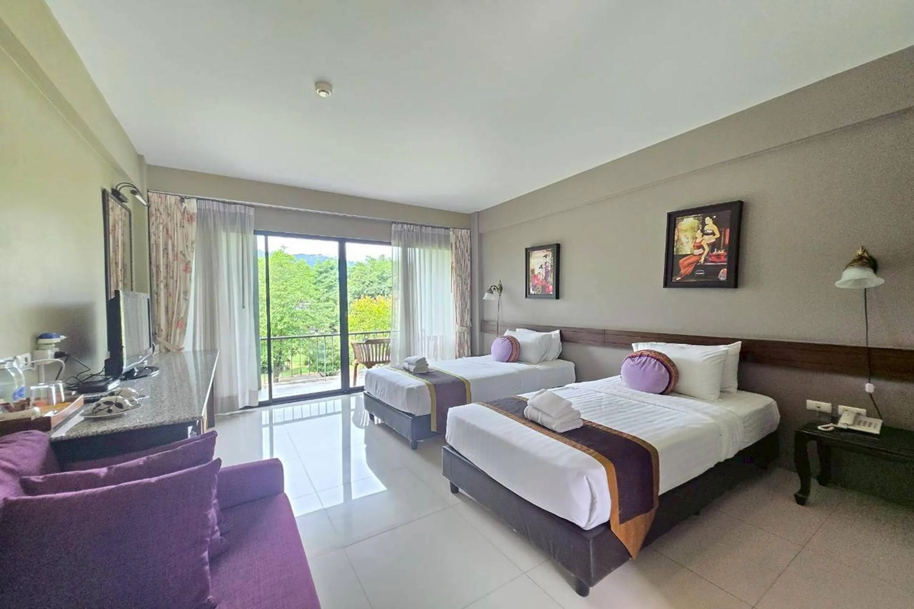 Photo of the whole room, Bed in Poonyamantra Resort Chiang Rai