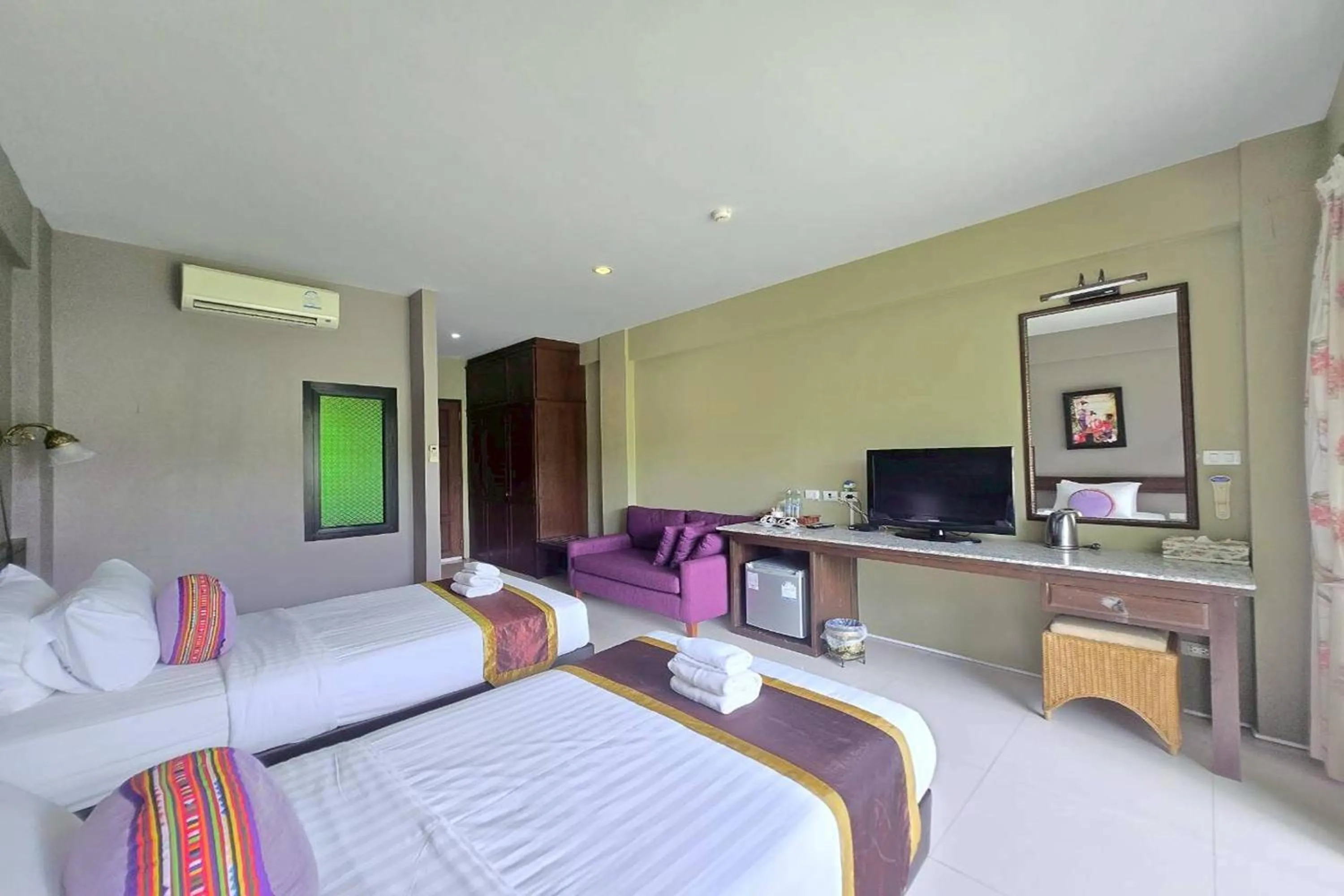 Photo of the whole room, Bed in Poonyamantra Resort Chiang Rai