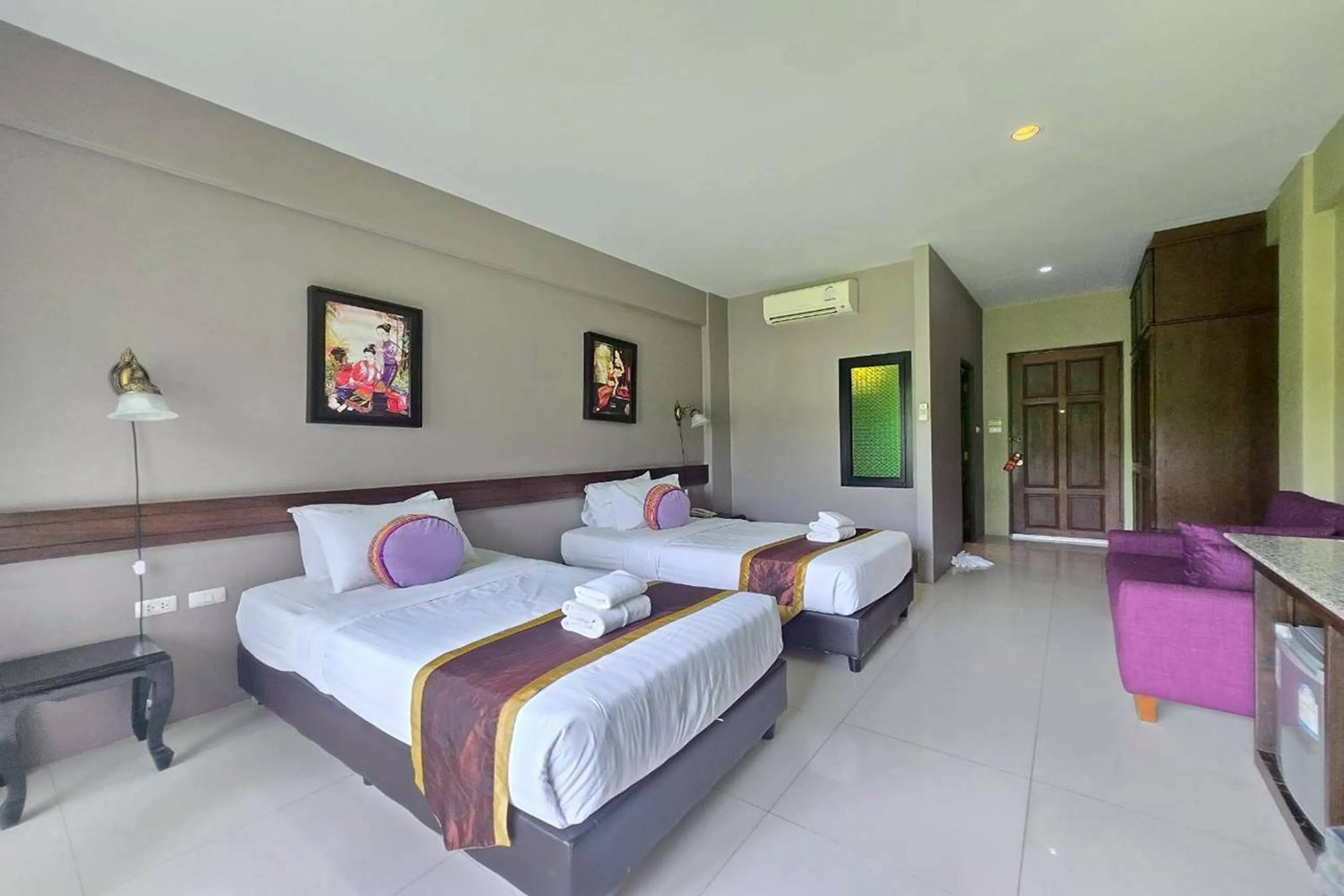 Photo of the whole room, Bed in Poonyamantra Resort Chiang Rai