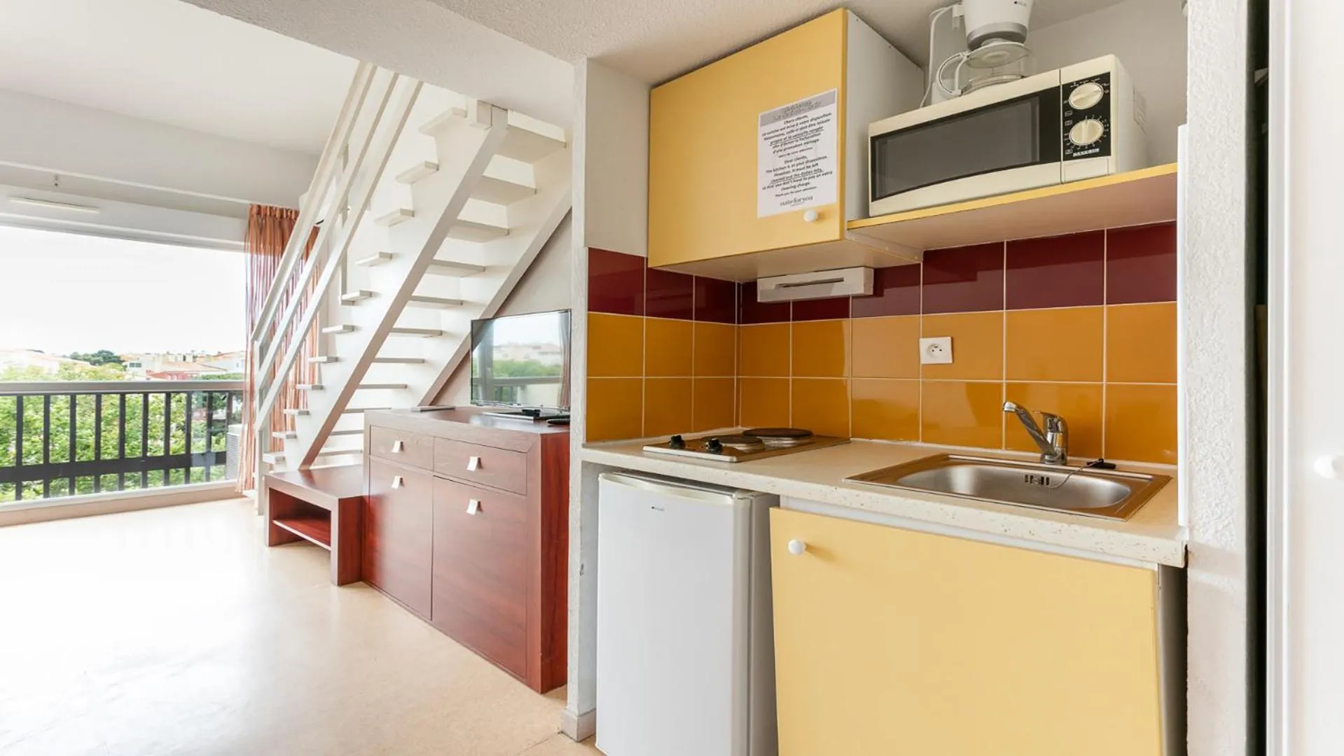 Kitchen or kitchenette in Vacancéole - Résidence Le Saint Clair