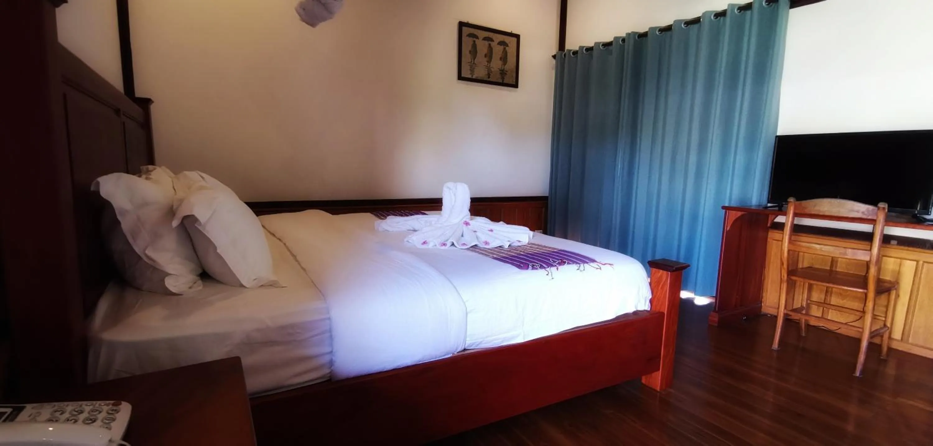 Bed in Luang Prabang Paradise Resort