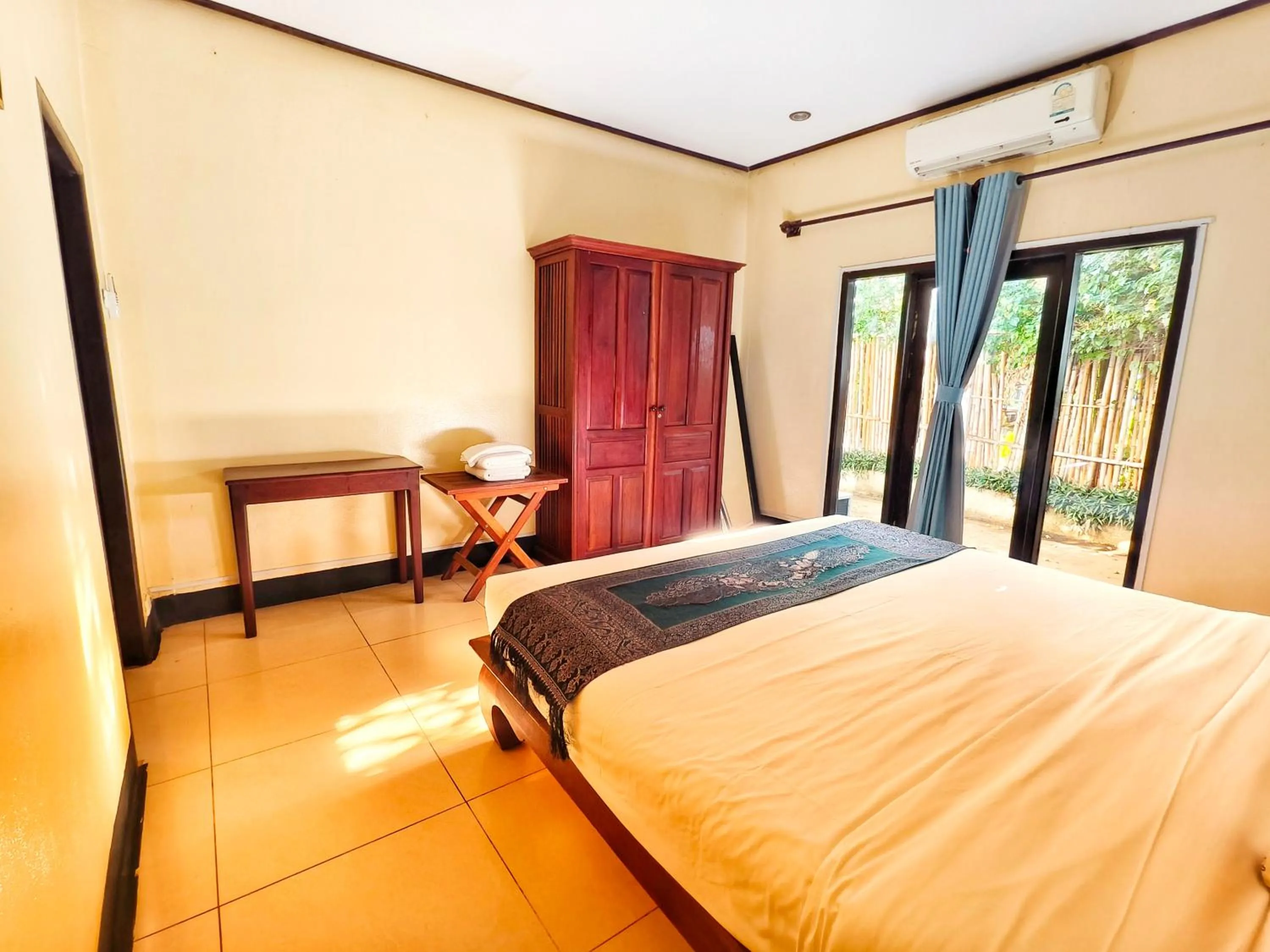 Bed in Luang Prabang chanon hotel