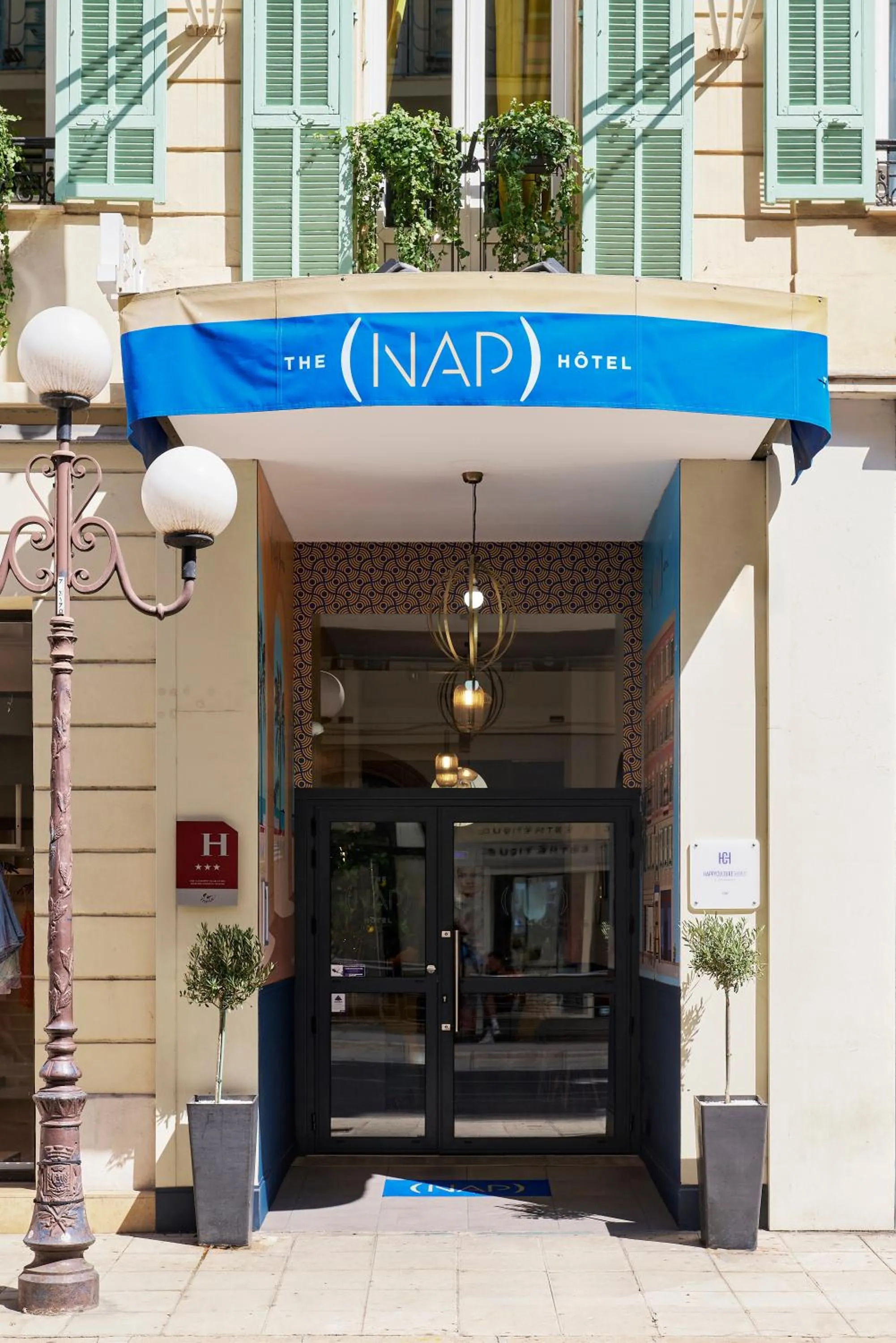 Property building in Hotel Nap By HappyCulture