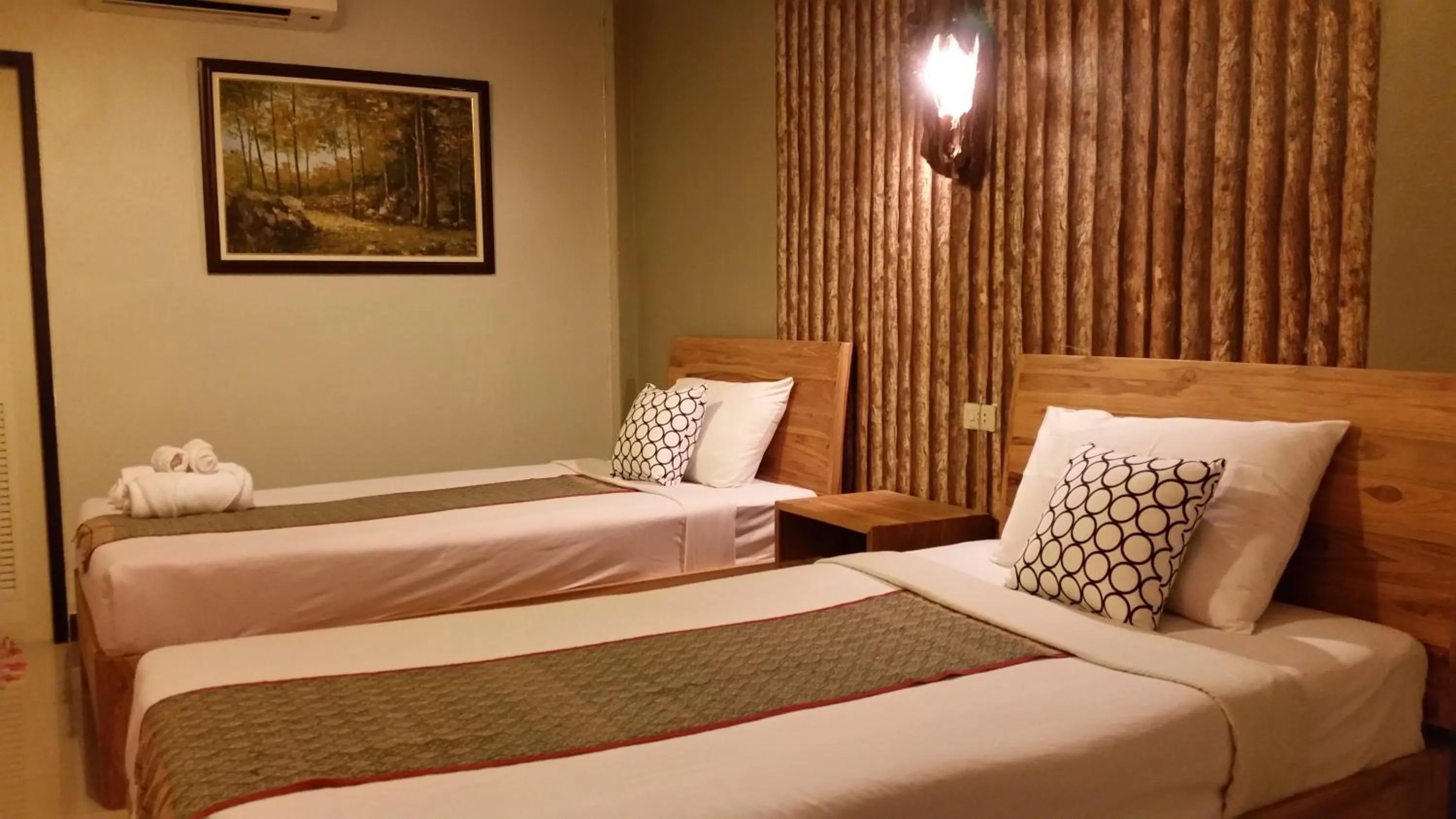 Bedroom in Baanplaidoi Resort