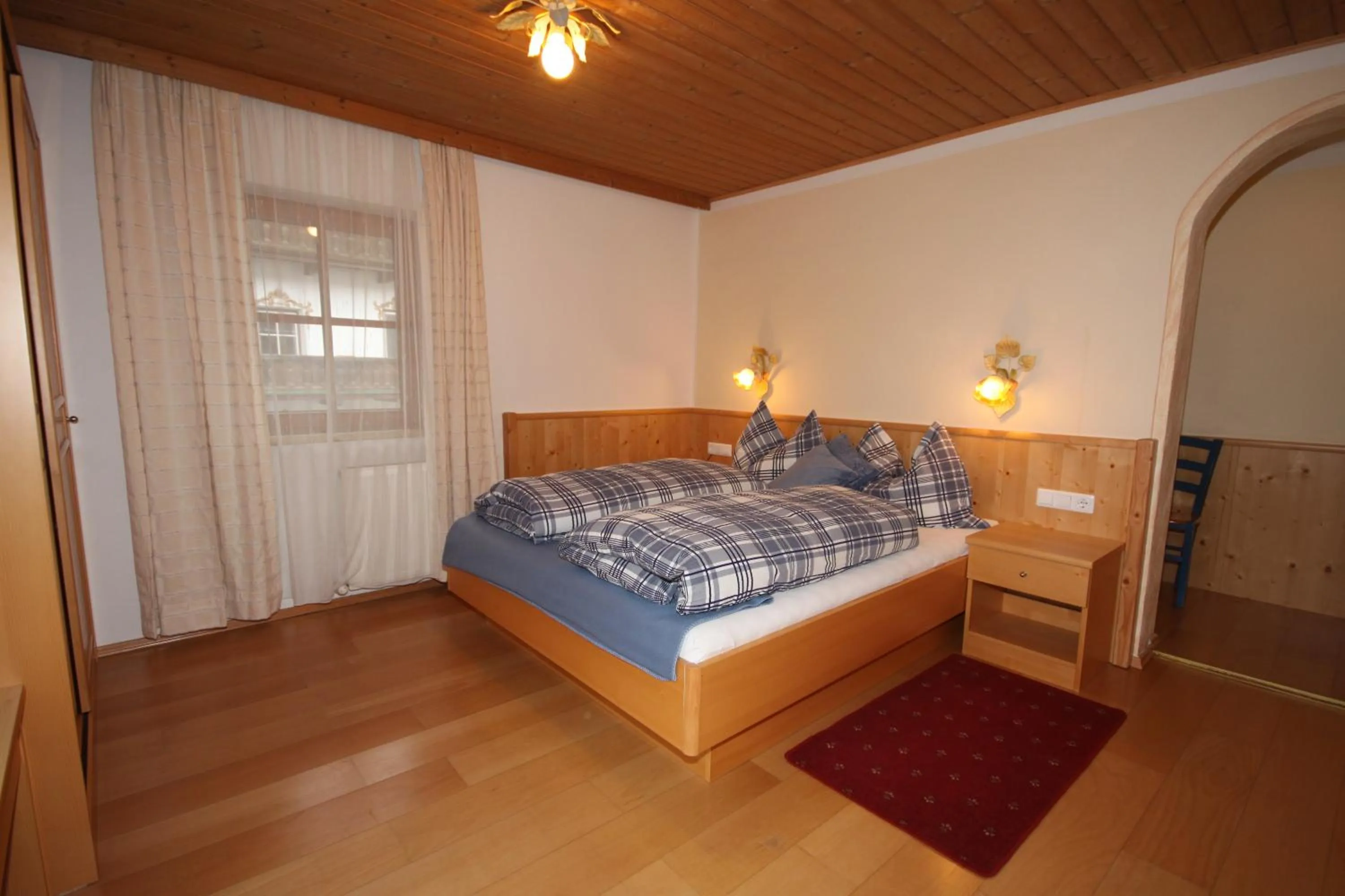 Bedroom, Bed in Ferienwohnungen Starchenthof - Wildschönau, Premiumcard inclusive