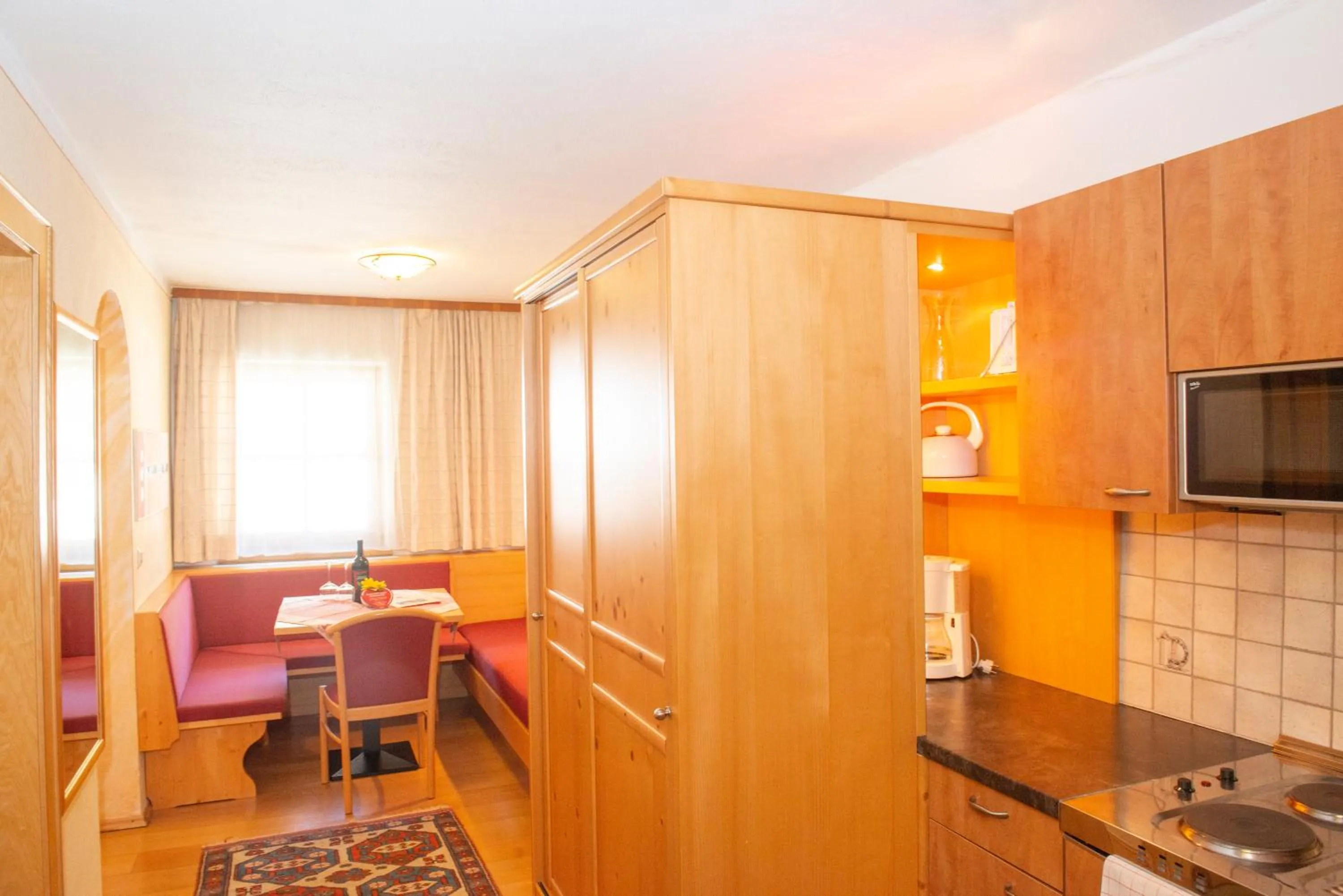 Kitchen or kitchenette in Ferienwohnungen Starchenthof - Wildschönau, Premiumcard inclusive