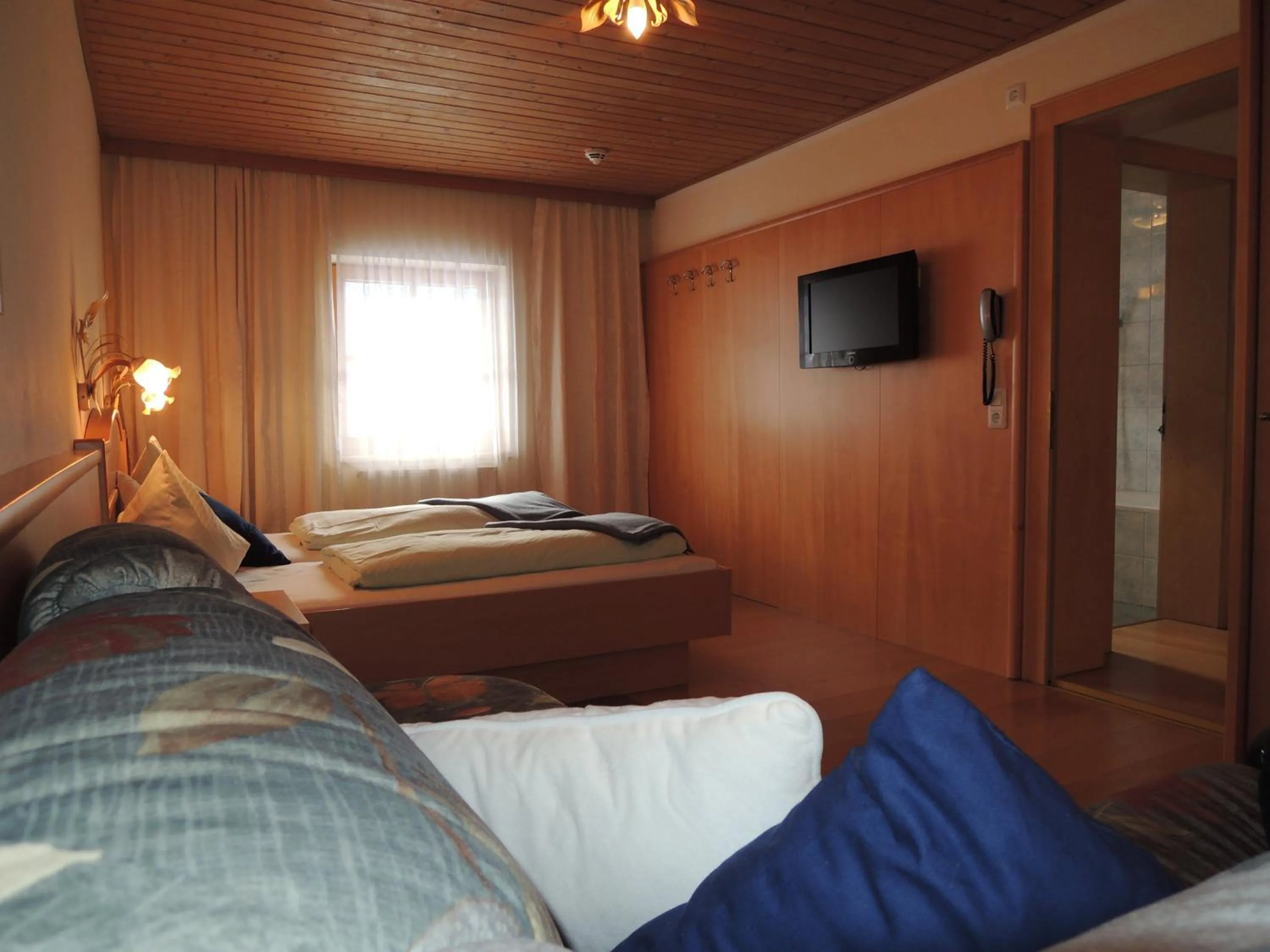 Bedroom, Bed in Ferienwohnungen Starchenthof - Wildschönau, Premiumcard inclusive