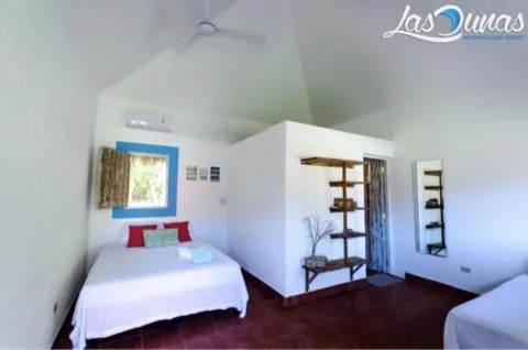 Bathroom, Bed in Las Dunas Surf Resort
