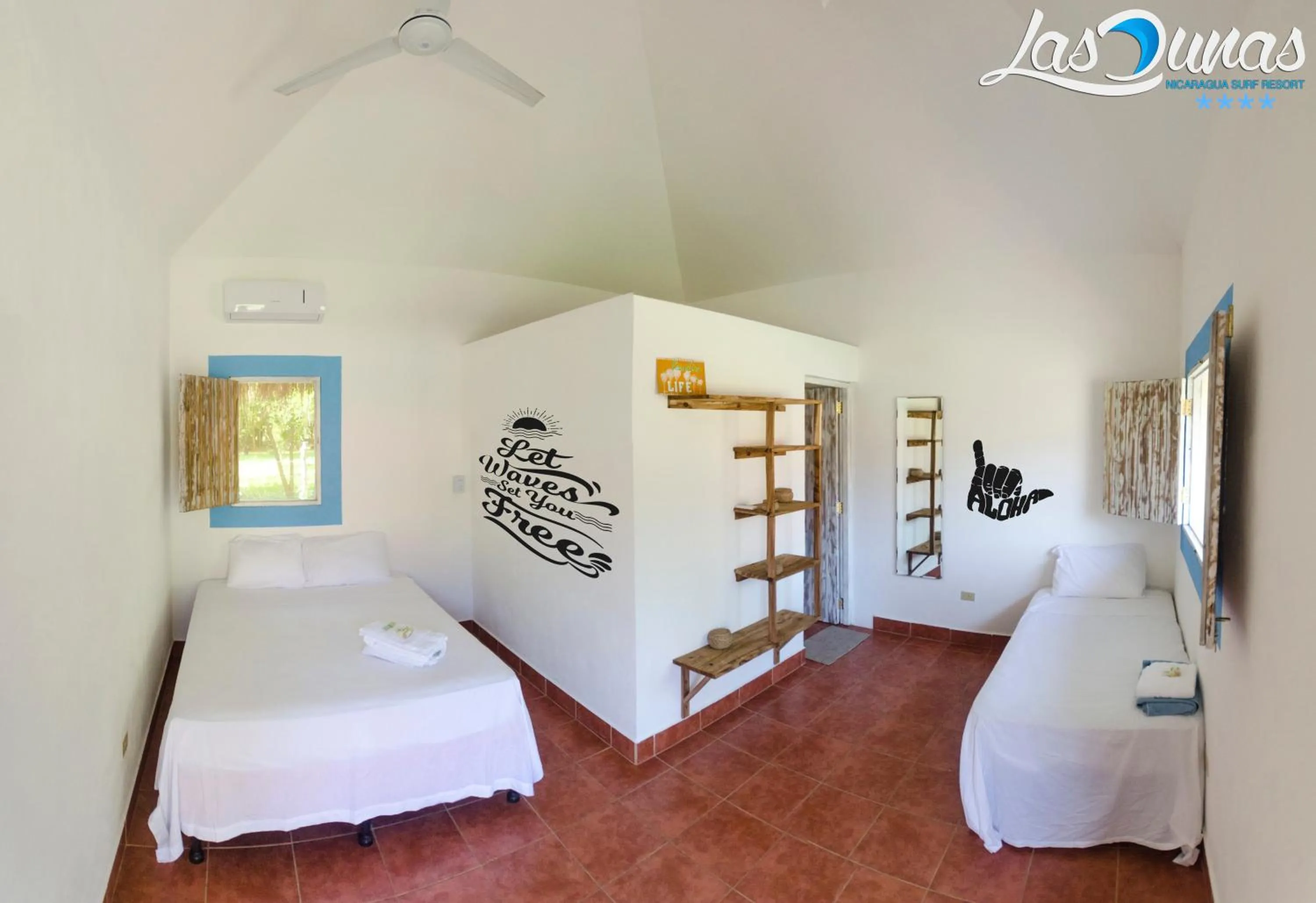 Photo of the whole room, Bed in Las Dunas Surf Resort