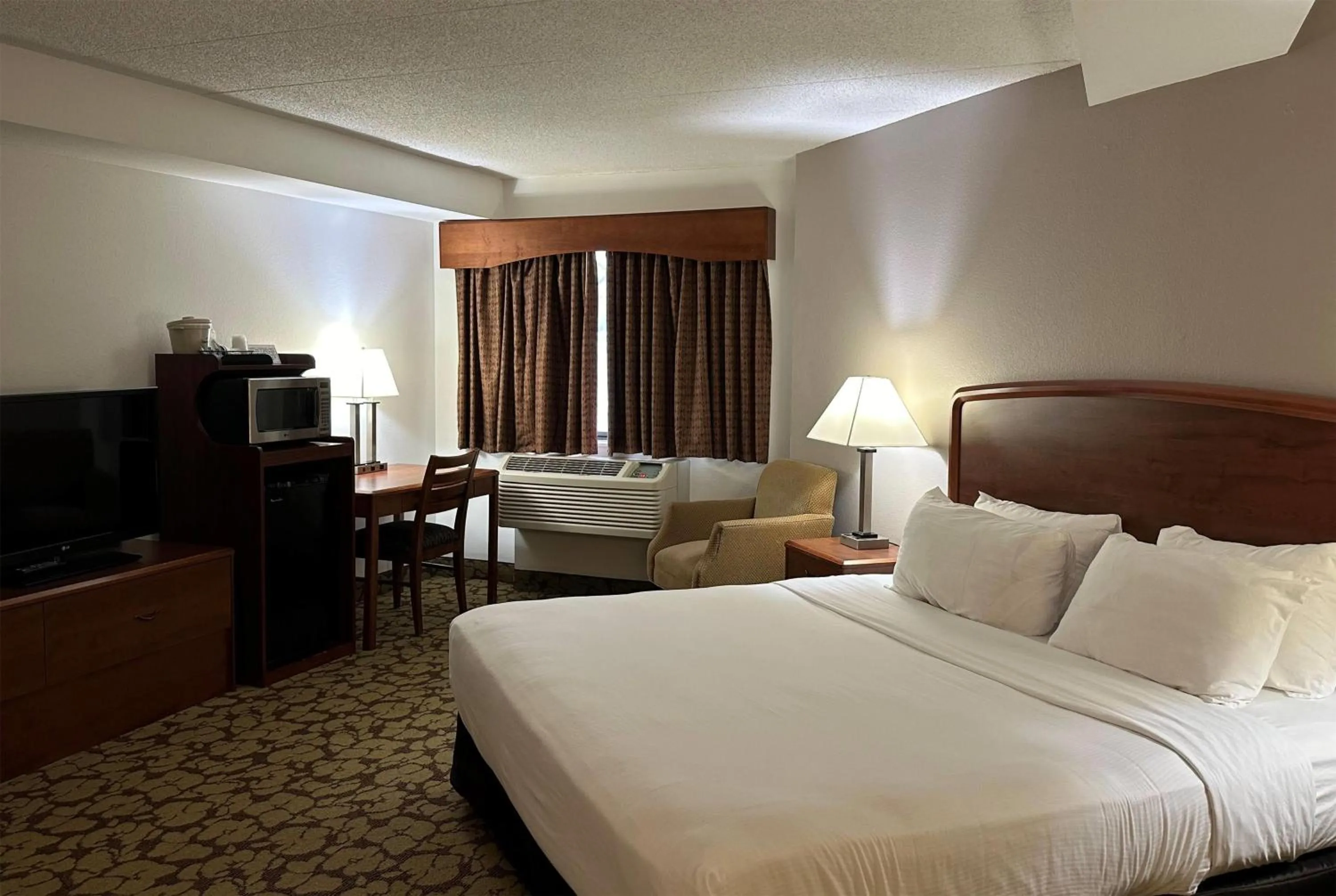 Photo of the whole room in AmericInn by Wyndham Appleton North Little Chute