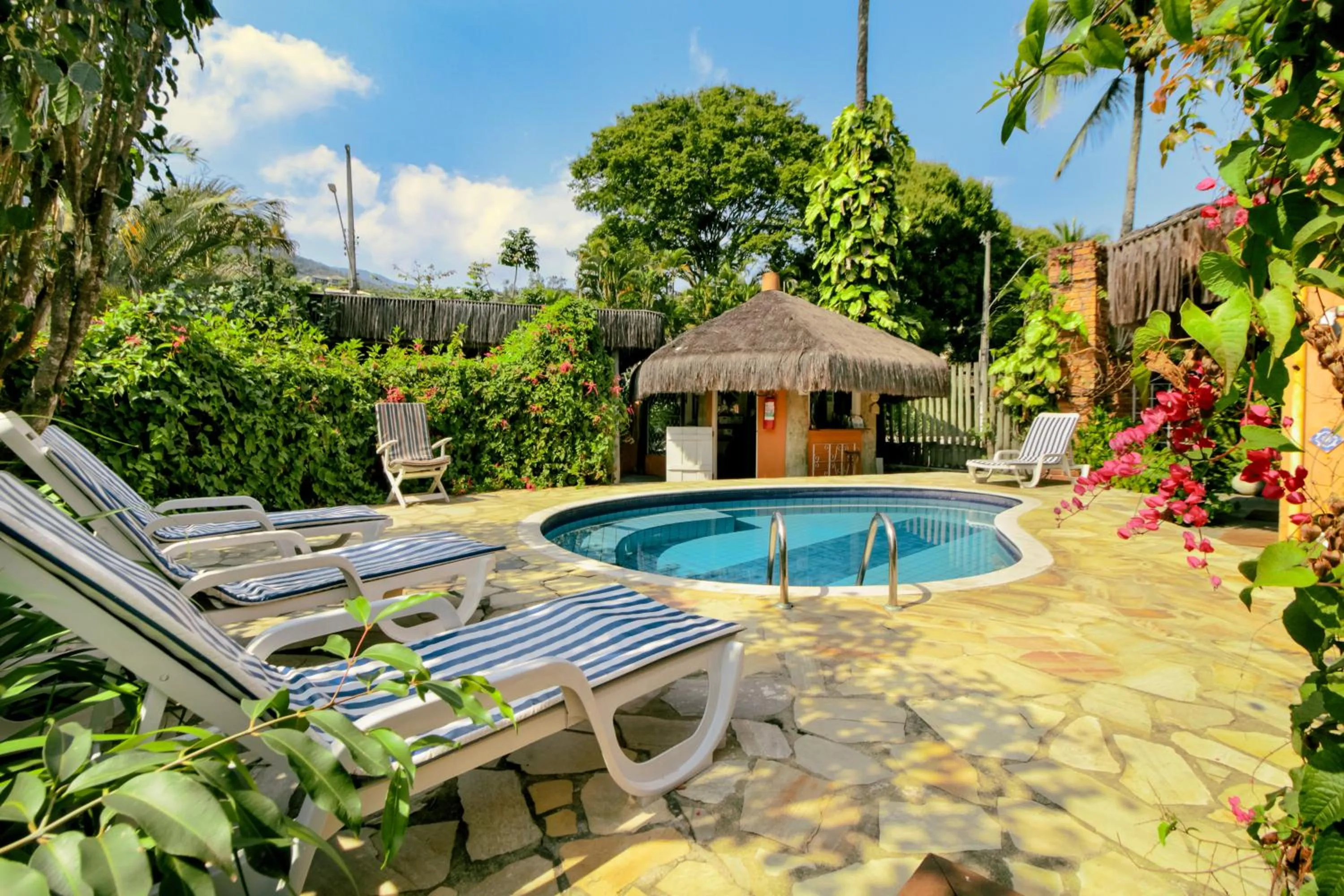 Swimming pool in VELINN Pousada Ponta do Pequeah