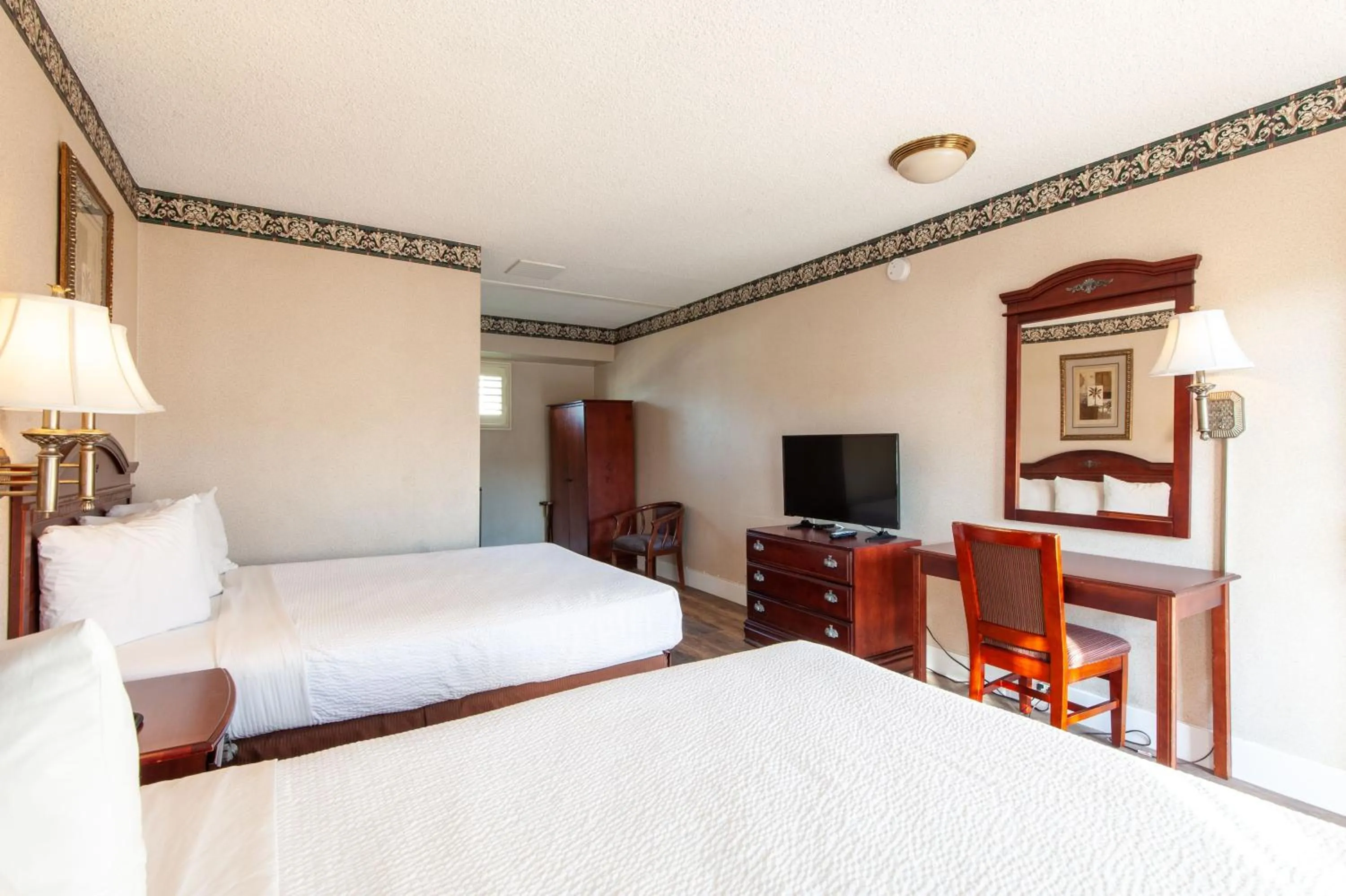 Photo of the whole room, Bed in Studio City Court Yard Hotel