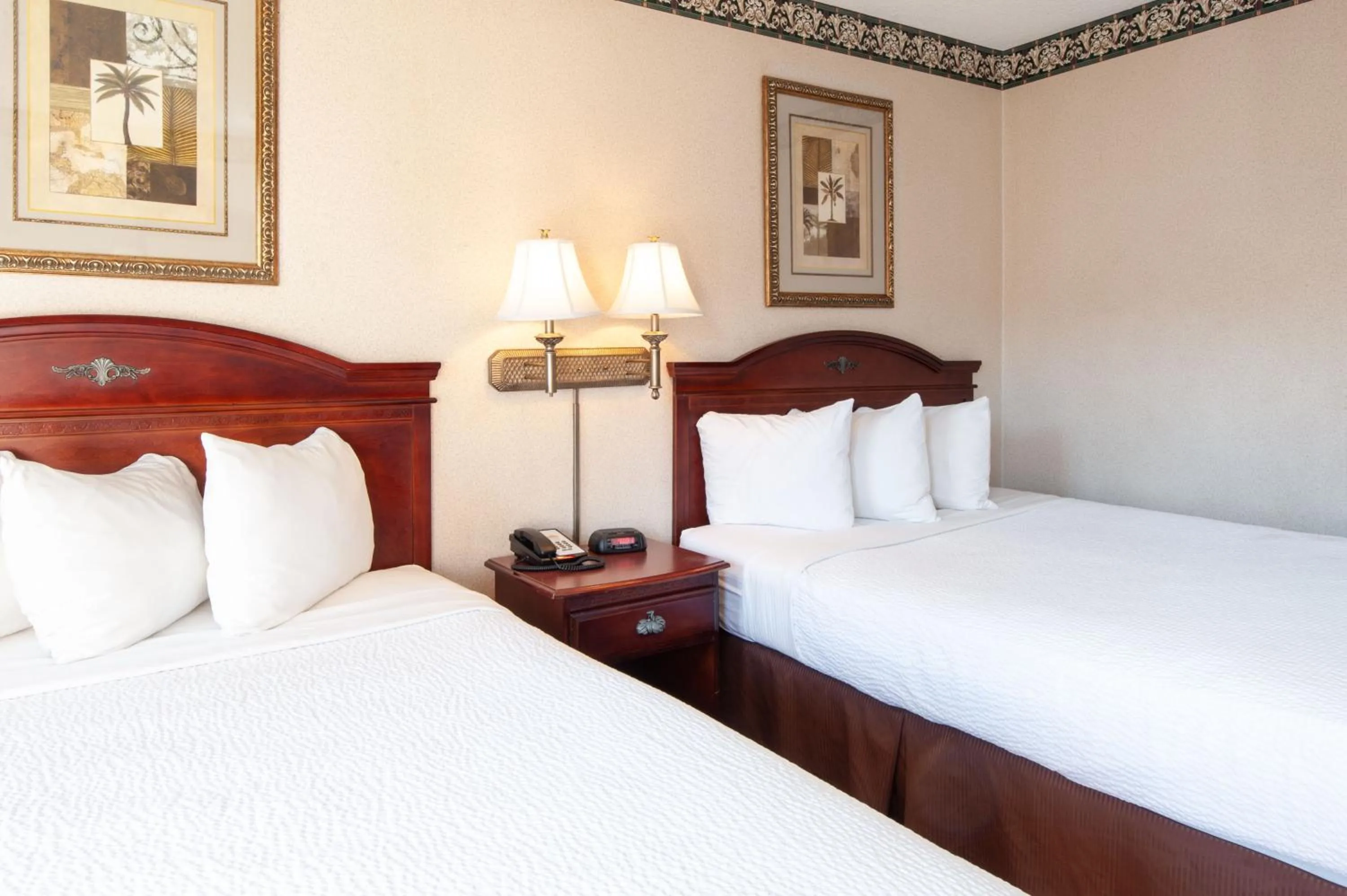 Bed in Studio City Court Yard Hotel