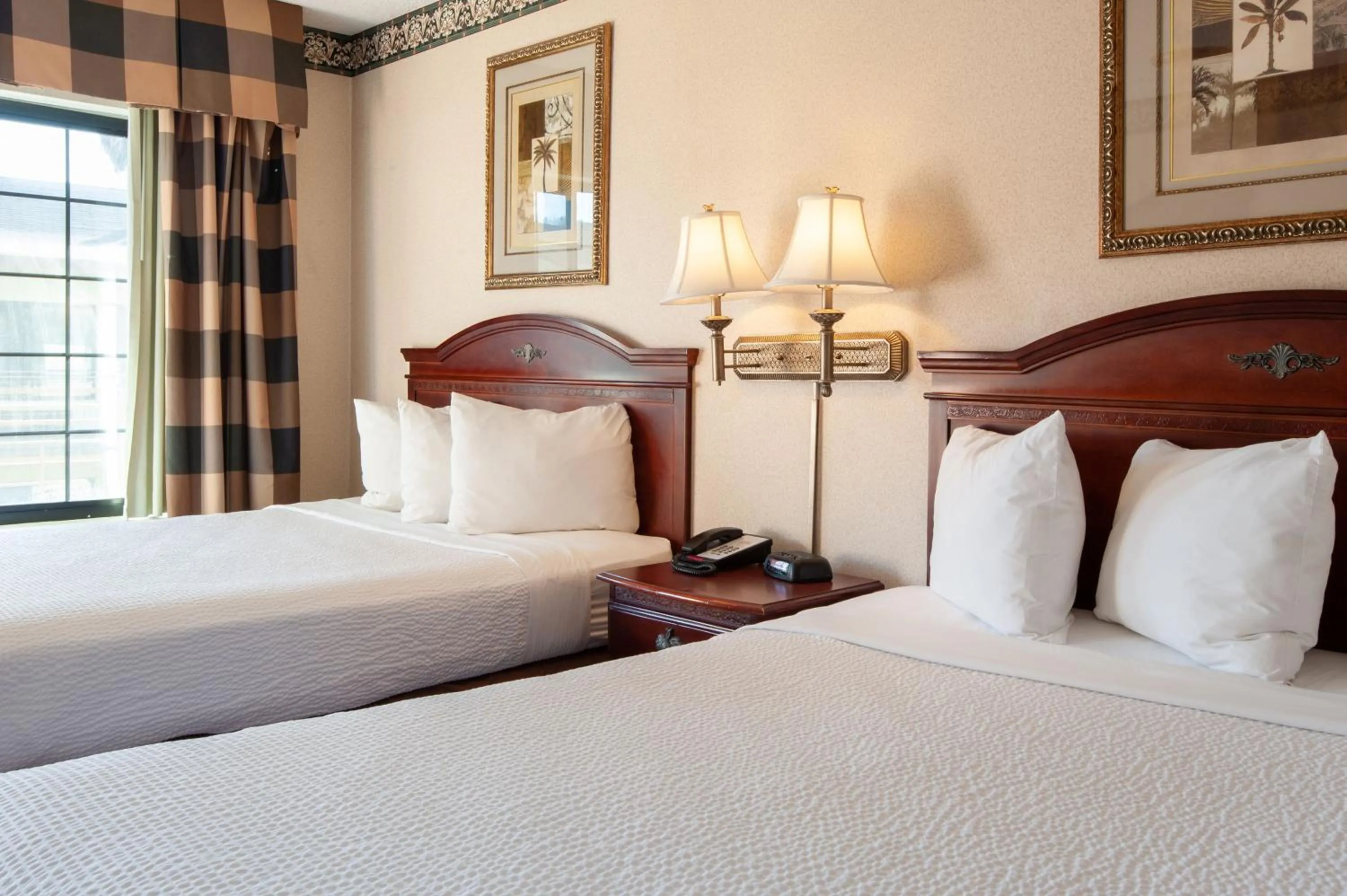 Bed in Studio City Court Yard Hotel