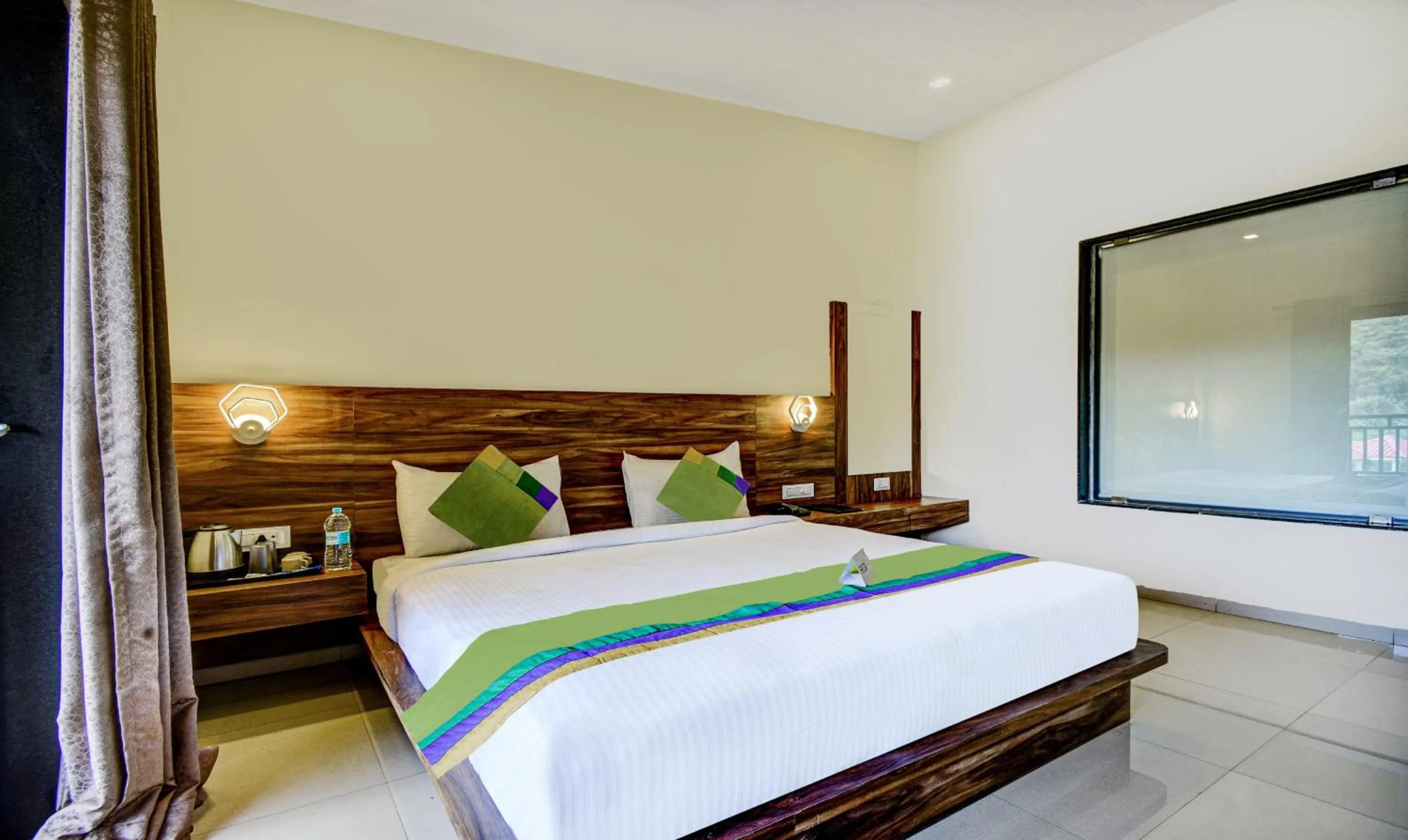 Bed in Treebo JP Cottage