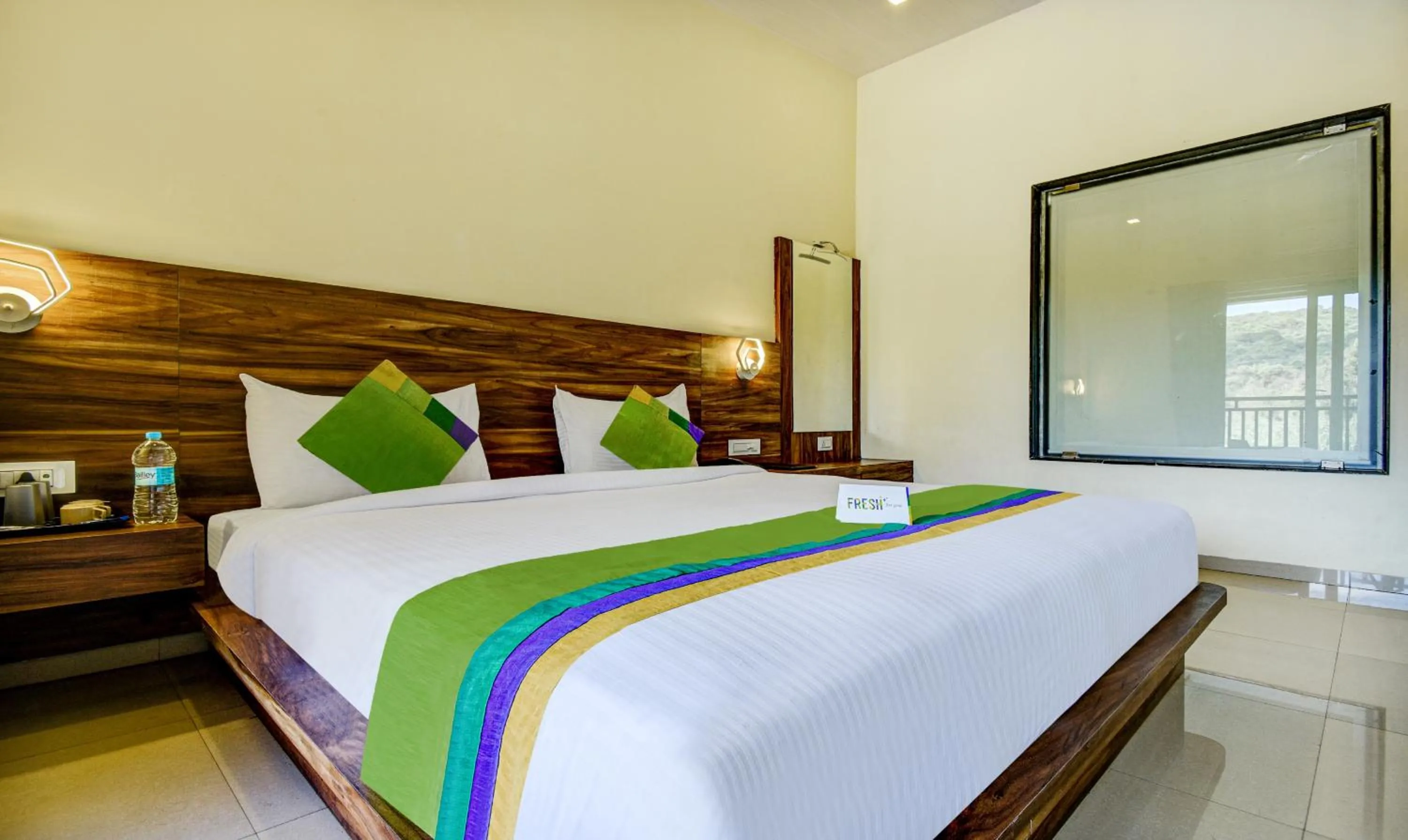 Bed in Treebo JP Cottage