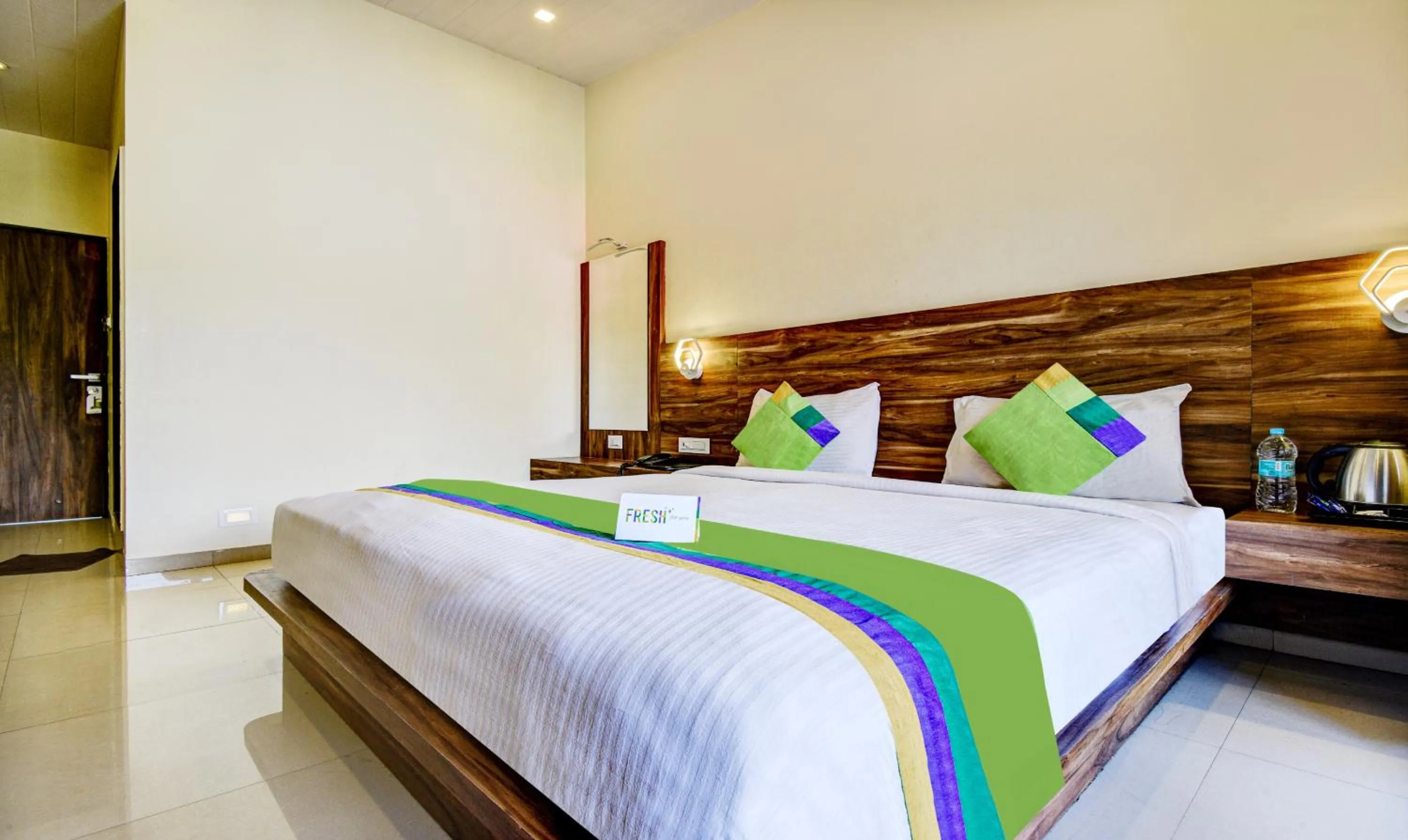 Bed in Treebo JP Cottage