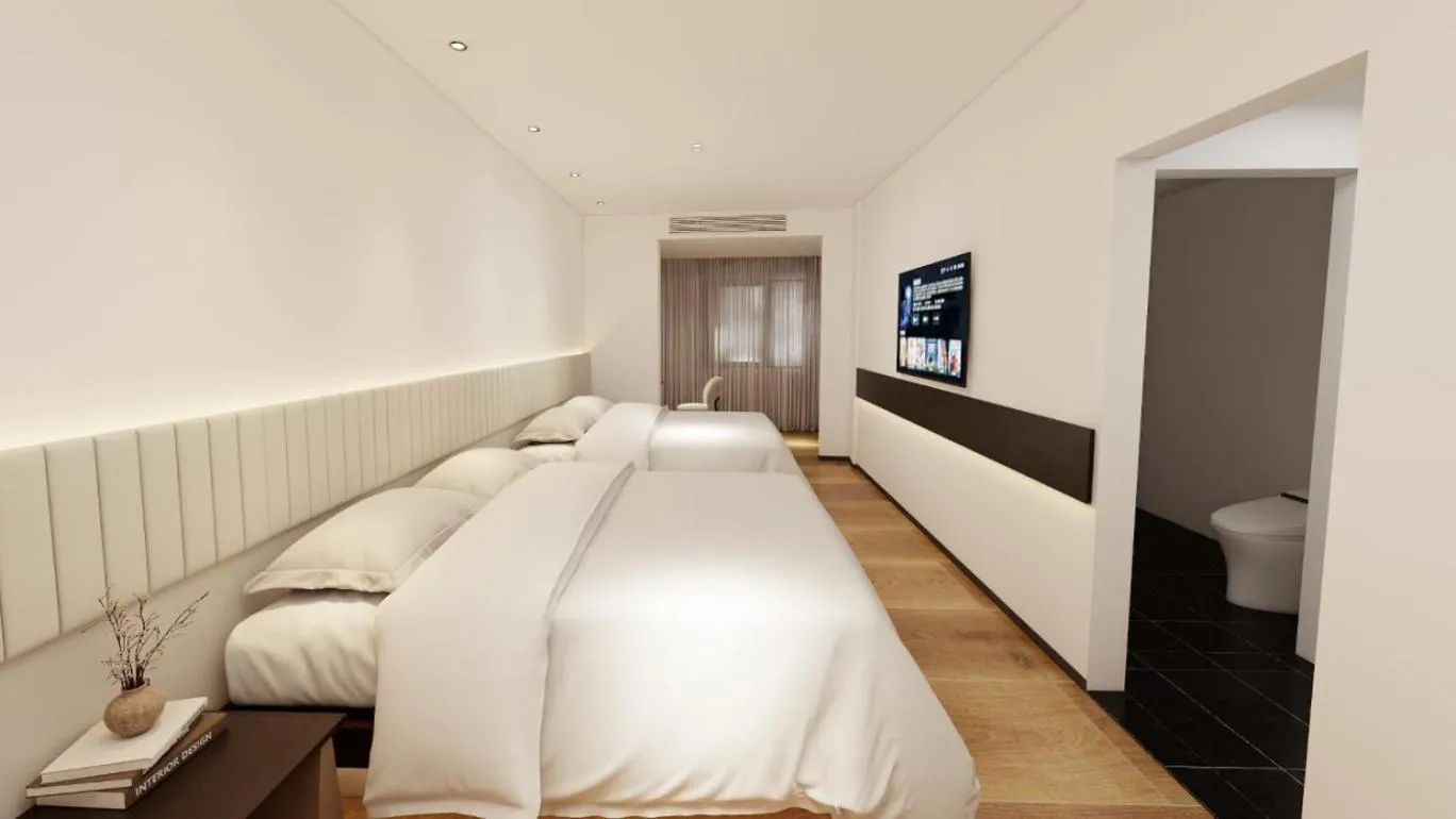 Photo of the whole room, Bed in Waito Hotel Yuexiu Park Guangzhou