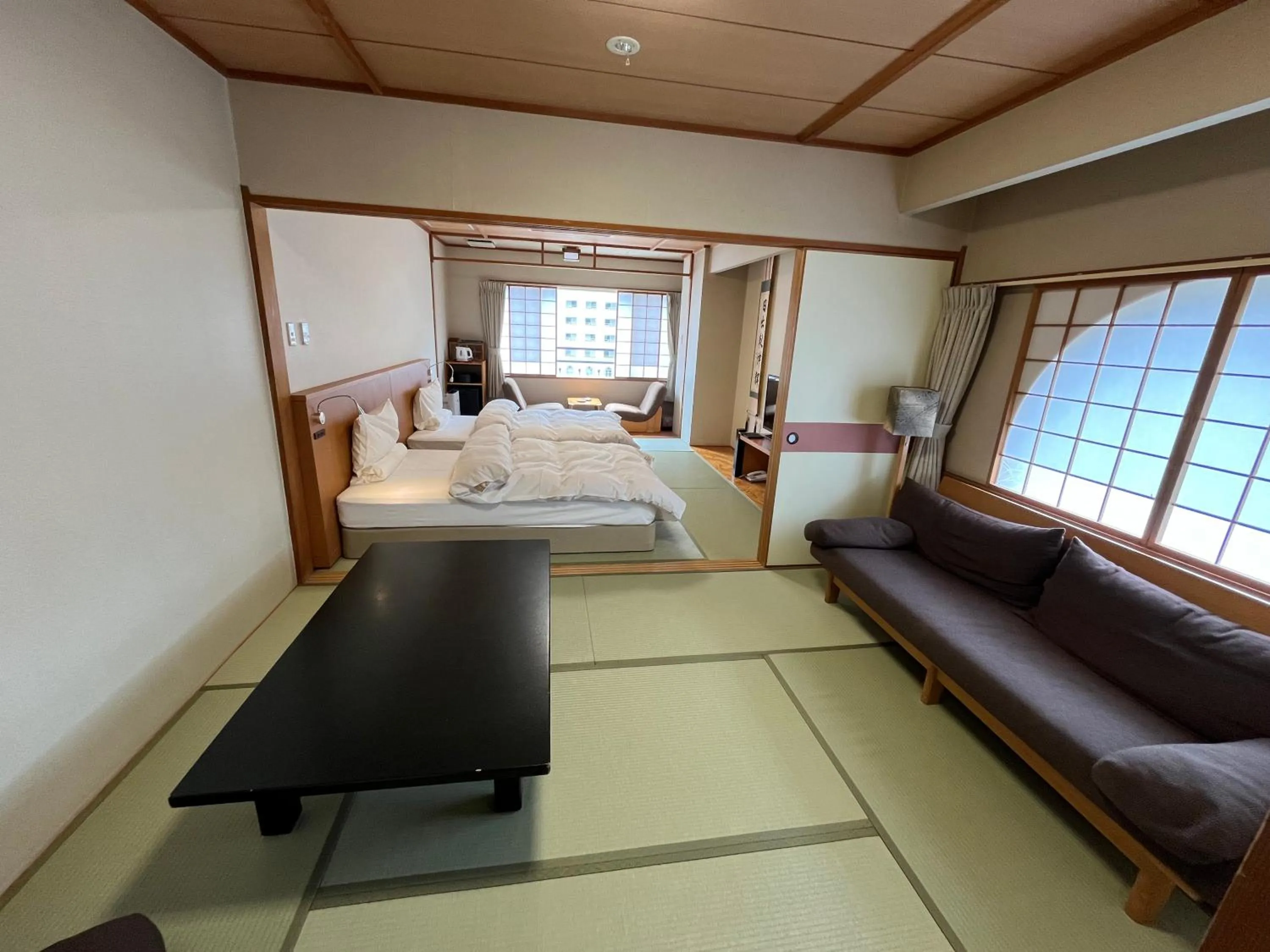 Living room, Bed in Takinoya Bekkan Tamanoyu