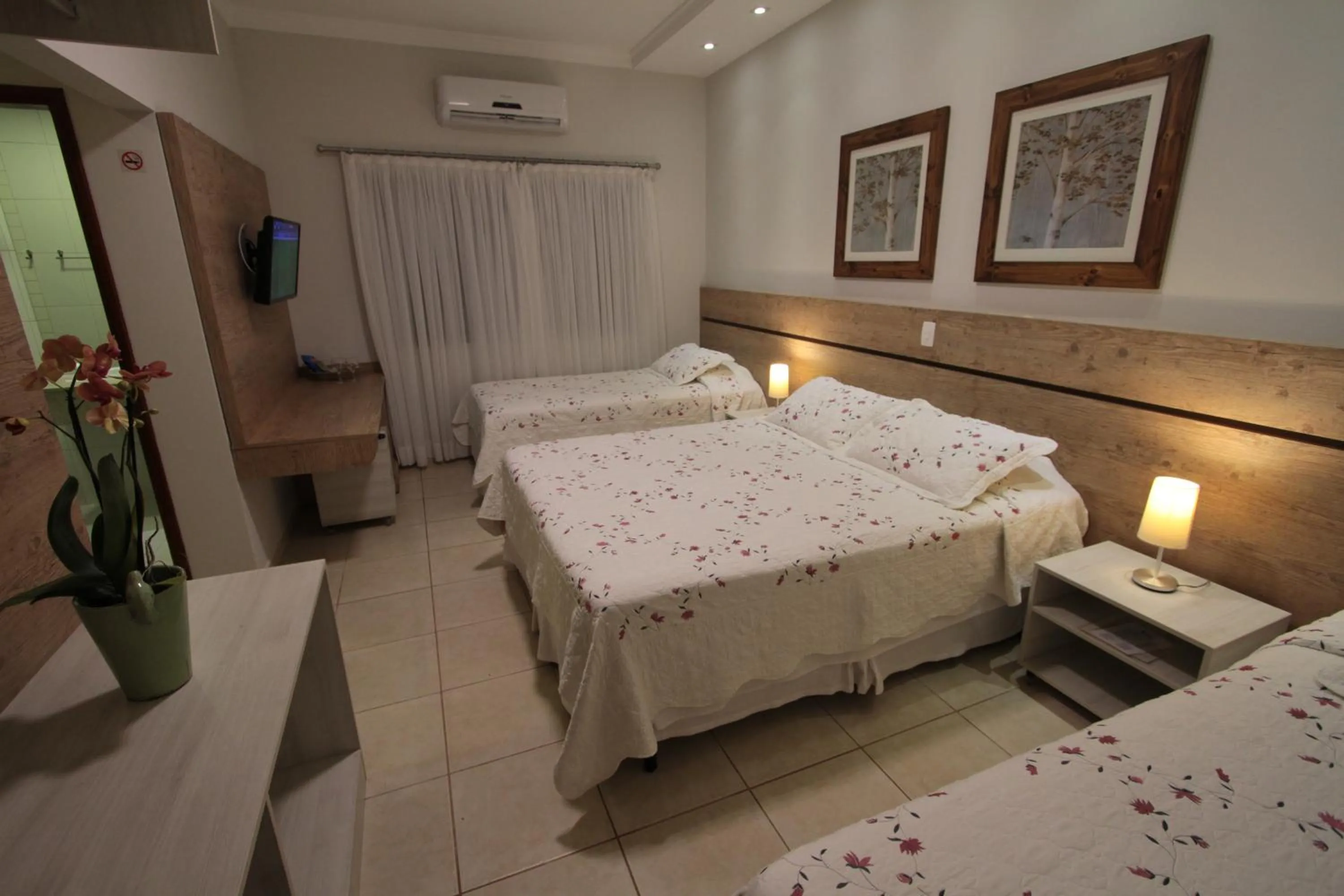 Photo of the whole room, Bed in Pousada Surucuá - Bonito MS