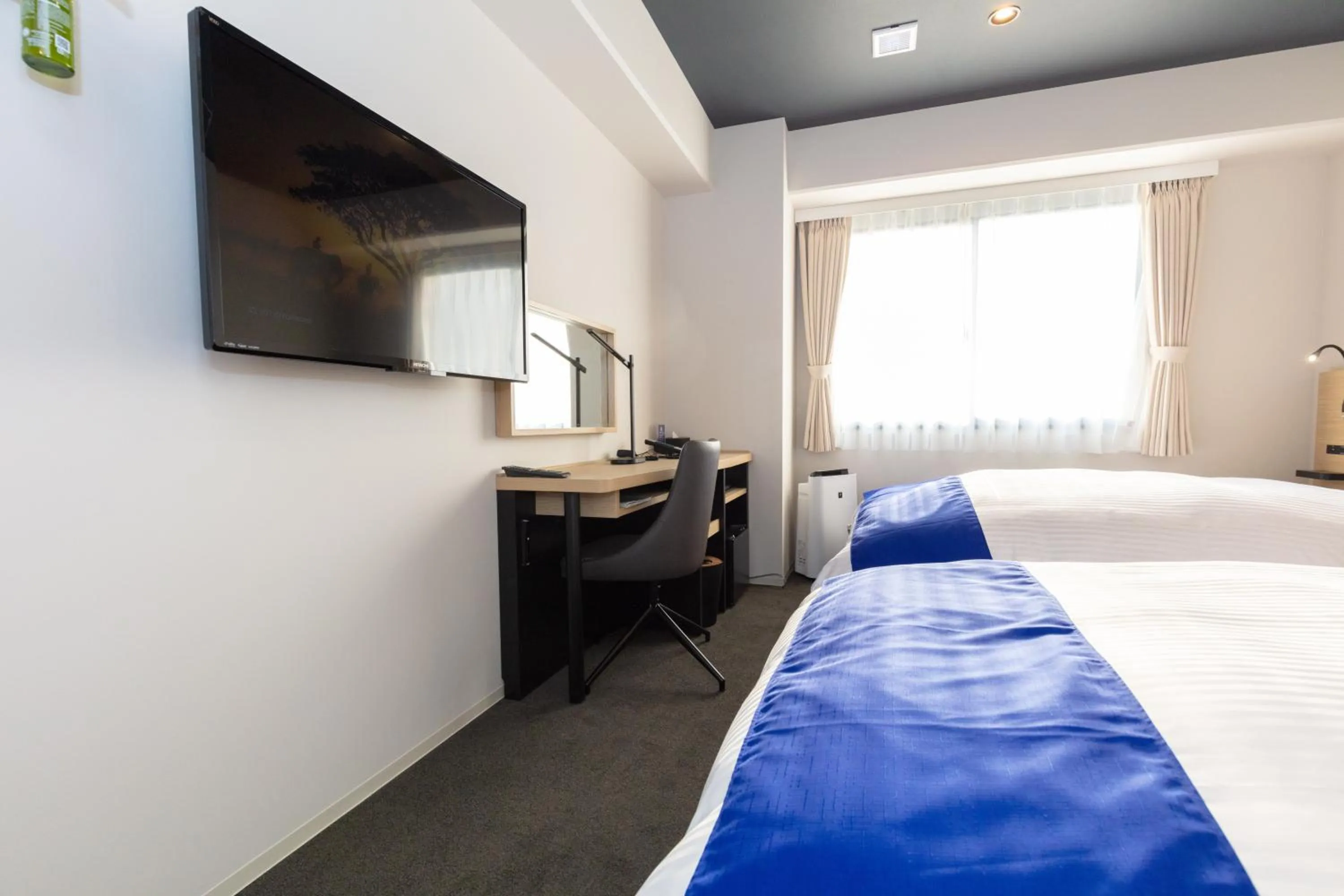 Bed in Ariston Hotel Kyoto Jujo