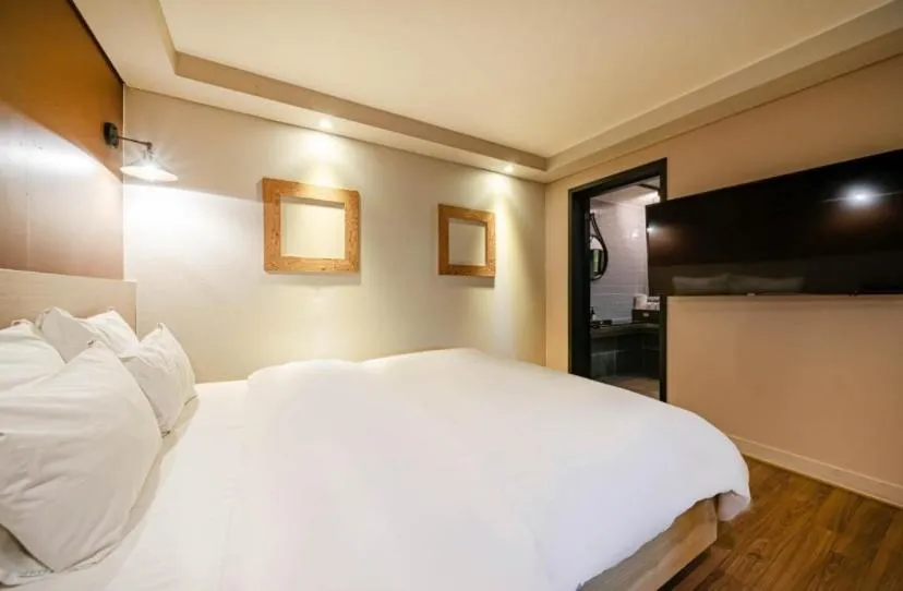 Bed in Ulsan Hotel 109