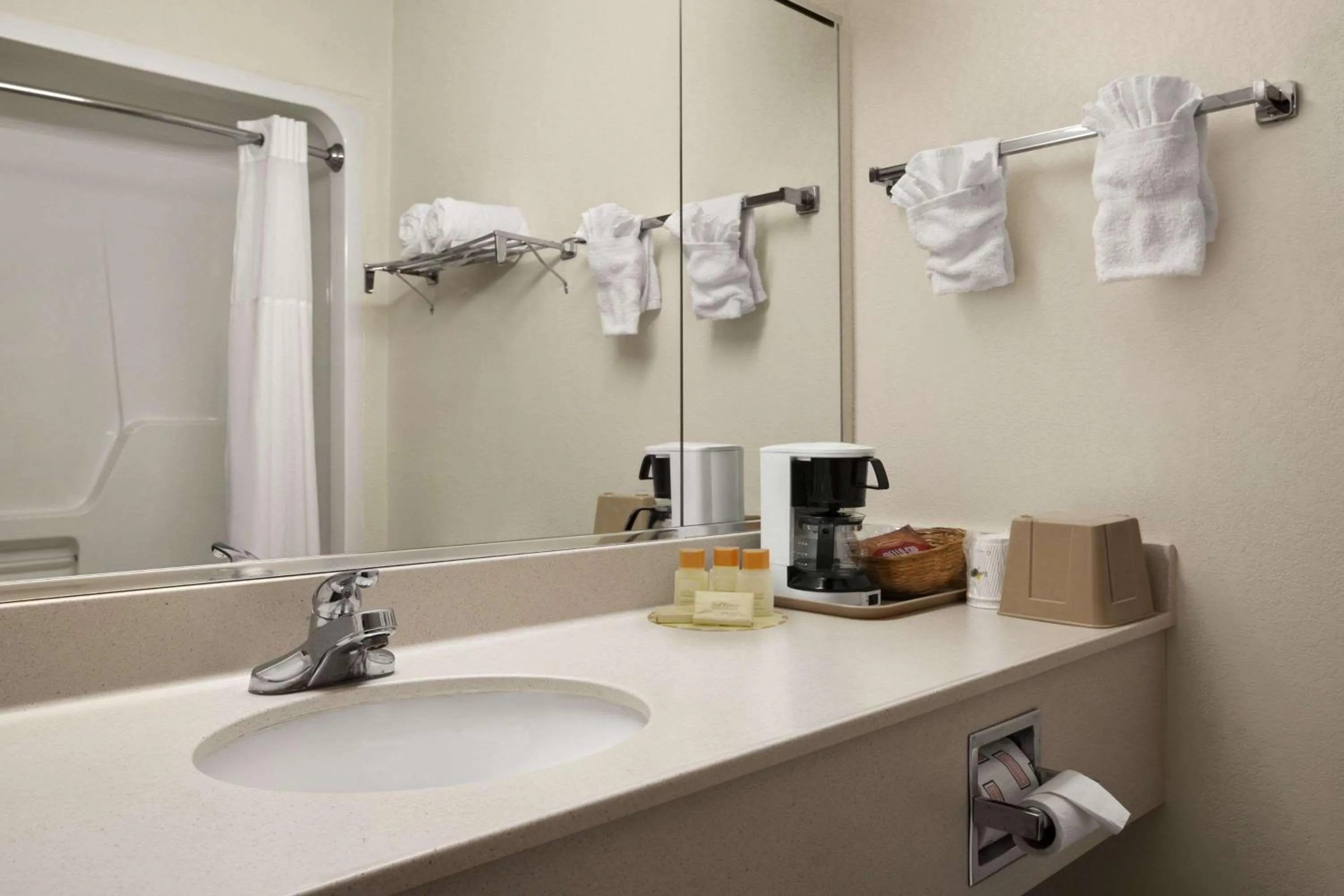 Bathroom in Days Inn & Suites by Wyndham Romeoville