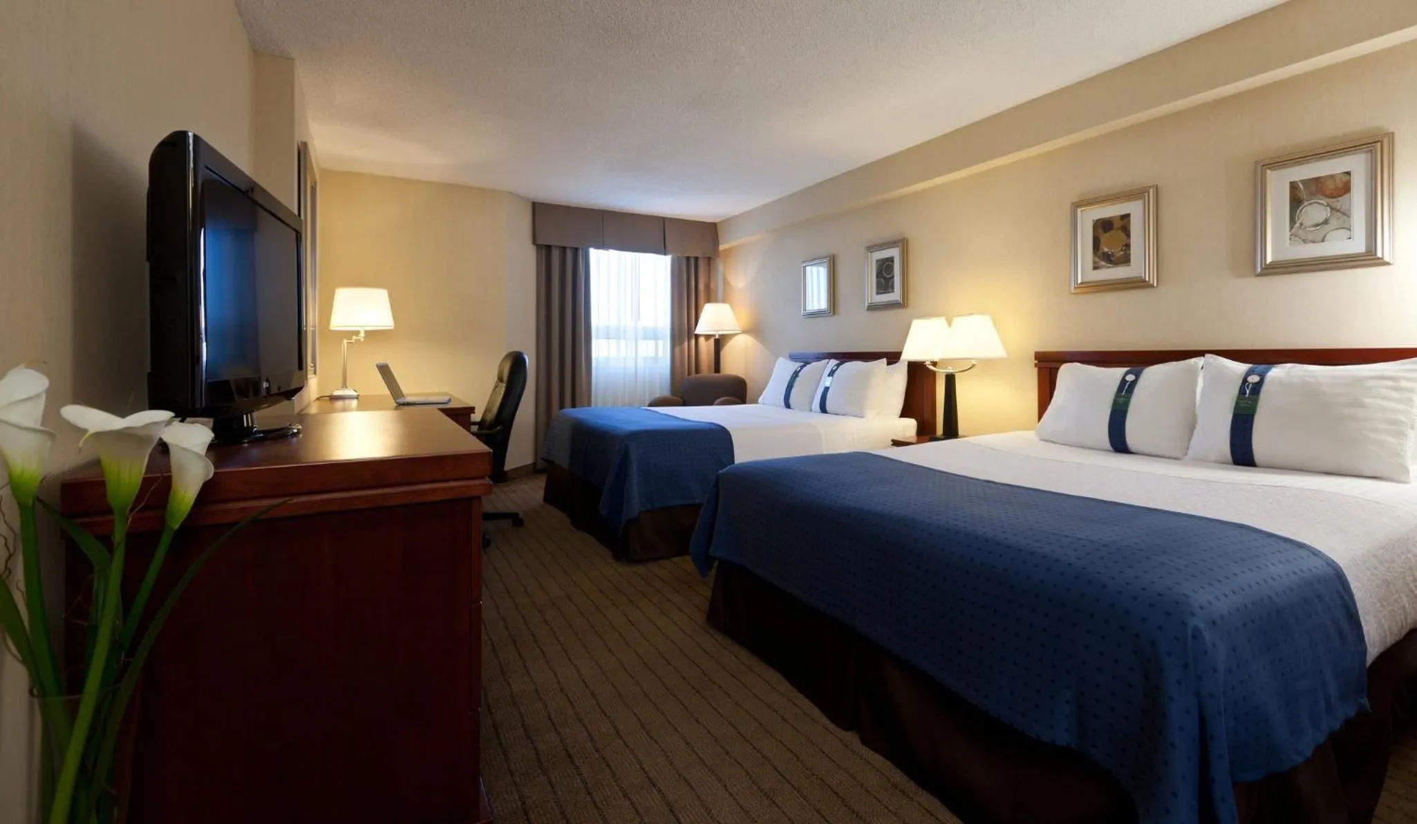 Photo of the whole room, Bed in Holiday Inn Laval Montreal by IHG