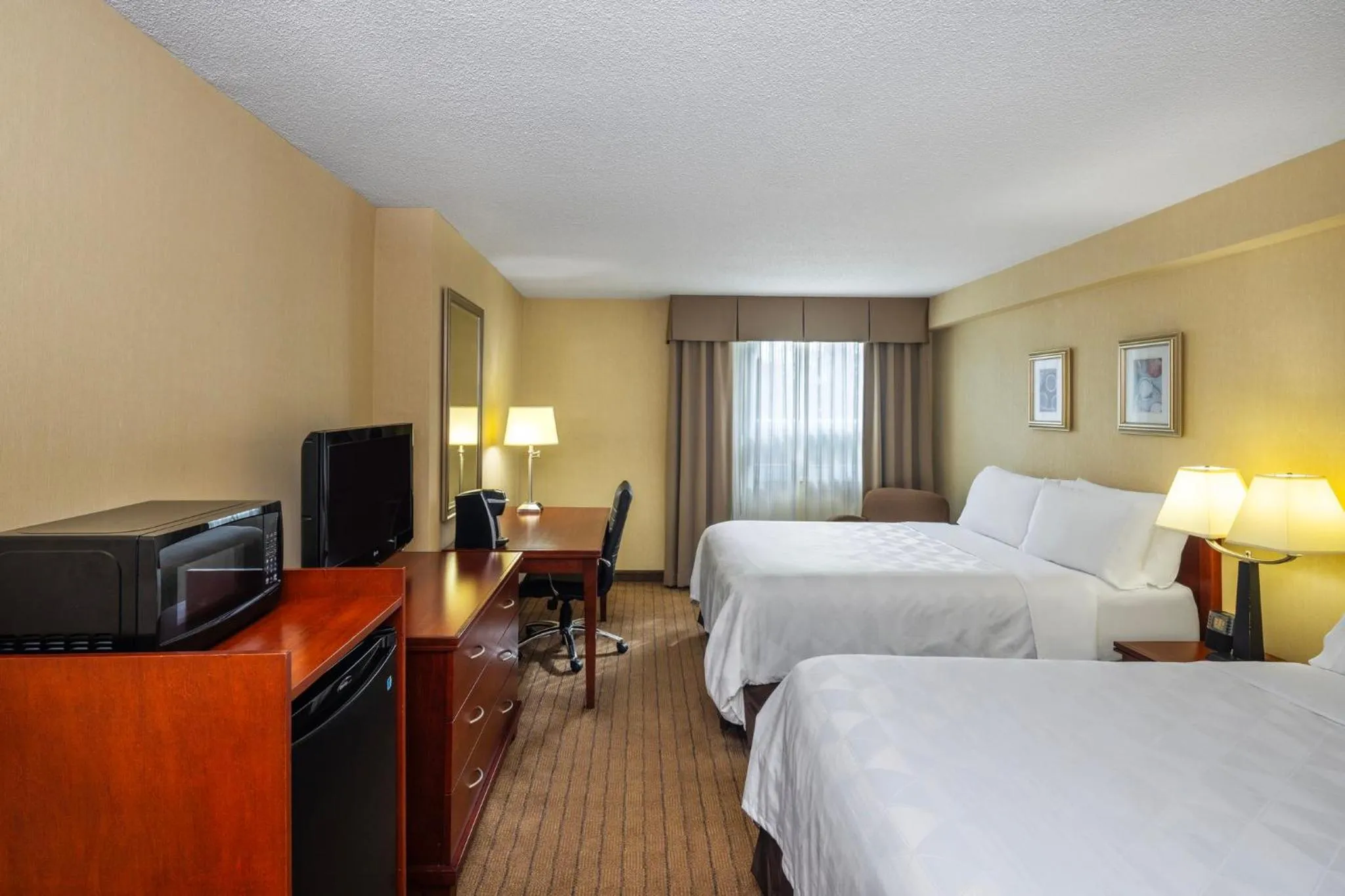 Photo of the whole room, Bed in Holiday Inn Laval Montreal by IHG