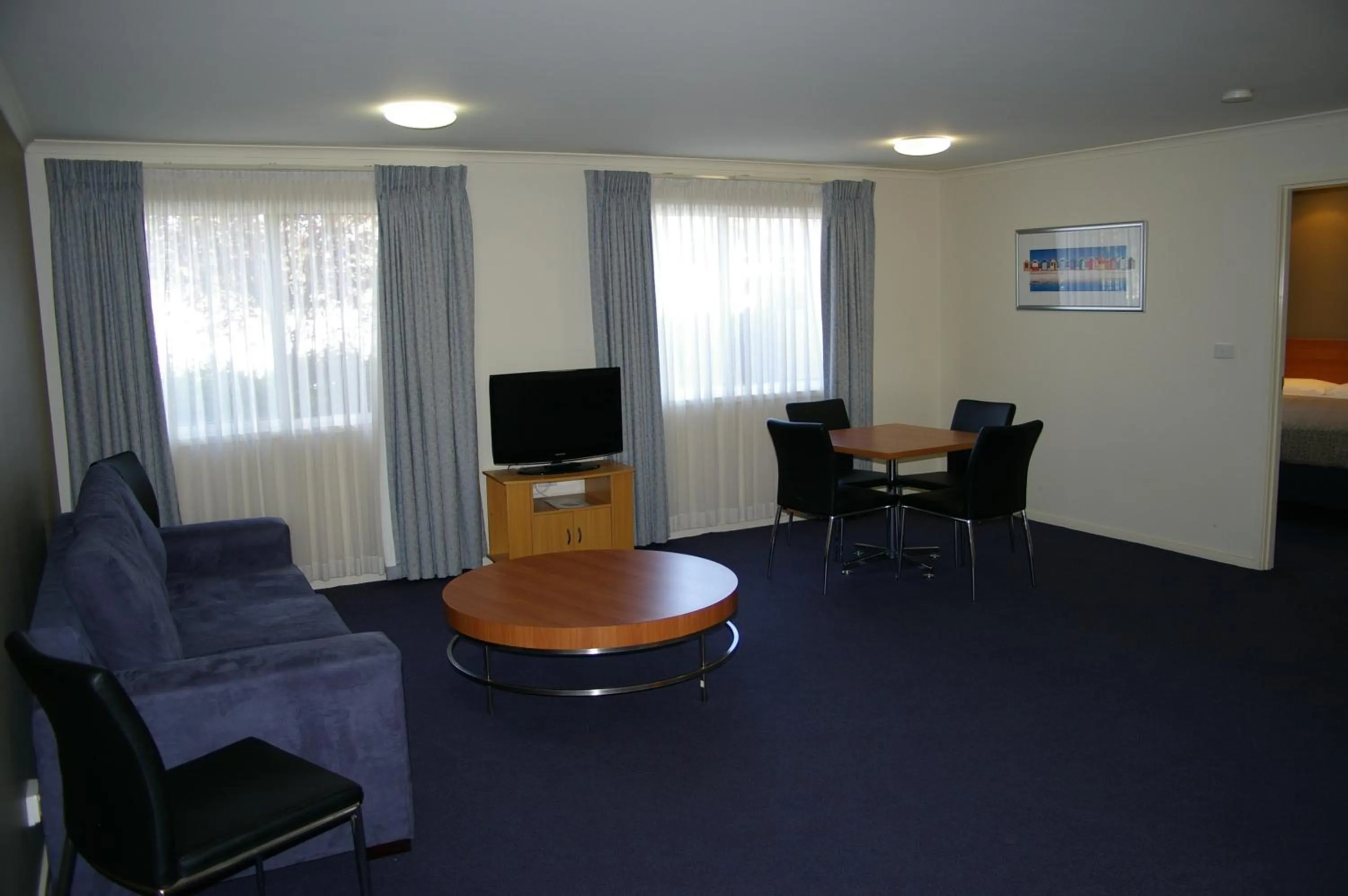 Living room in Ramada Encore by Wyndham Belconnen Canberra