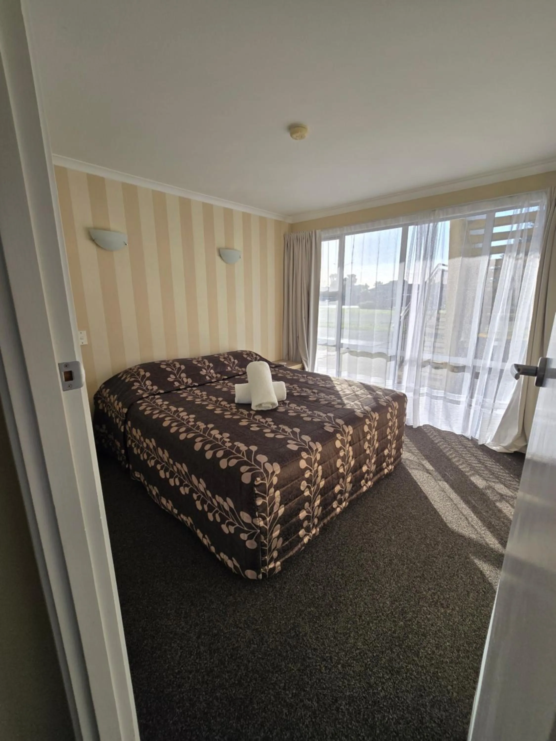 Bed in Monarch Motel