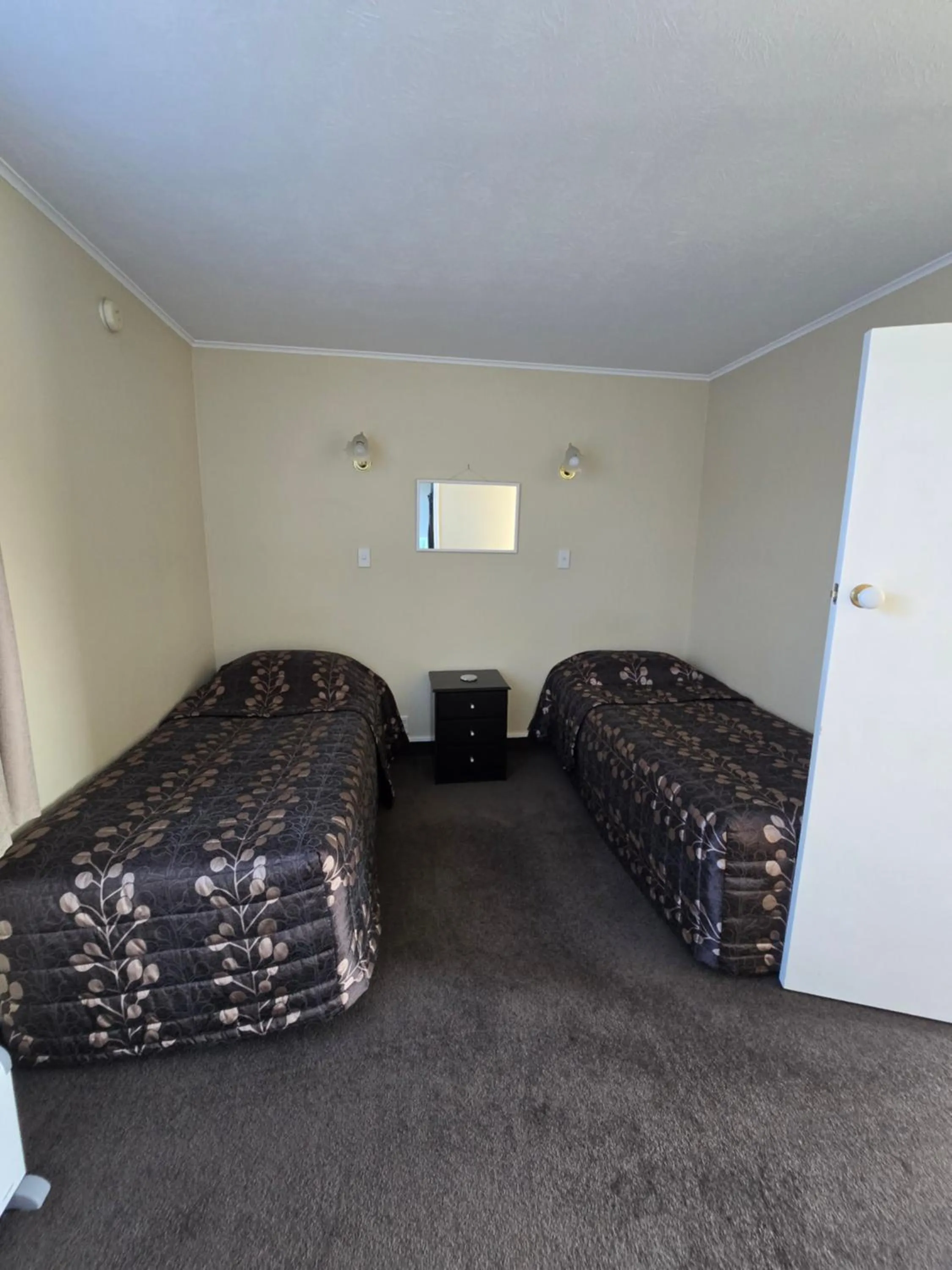 Bed in Monarch Motel