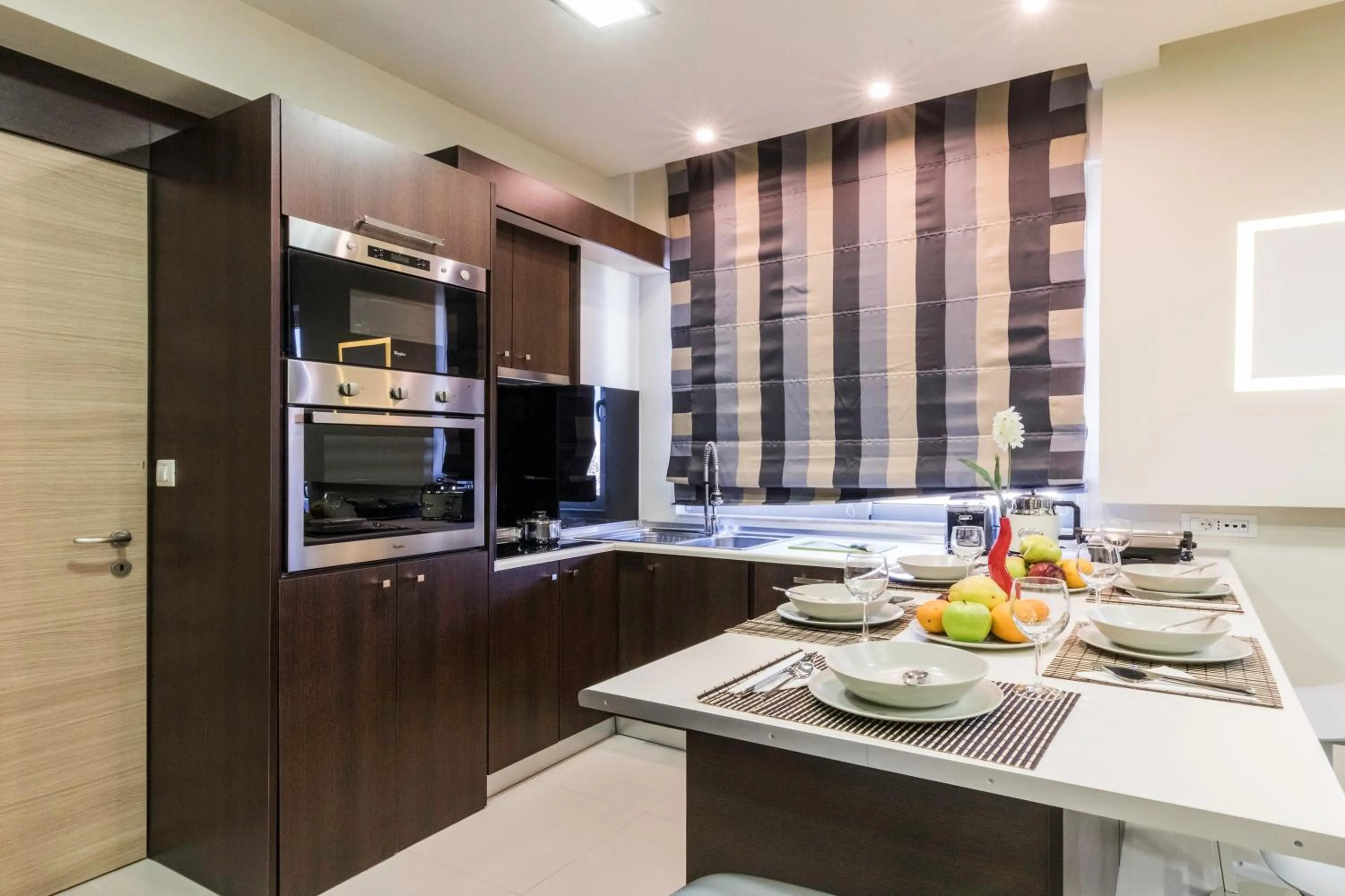 Kitchen or kitchenette in Rhodes Central Suite