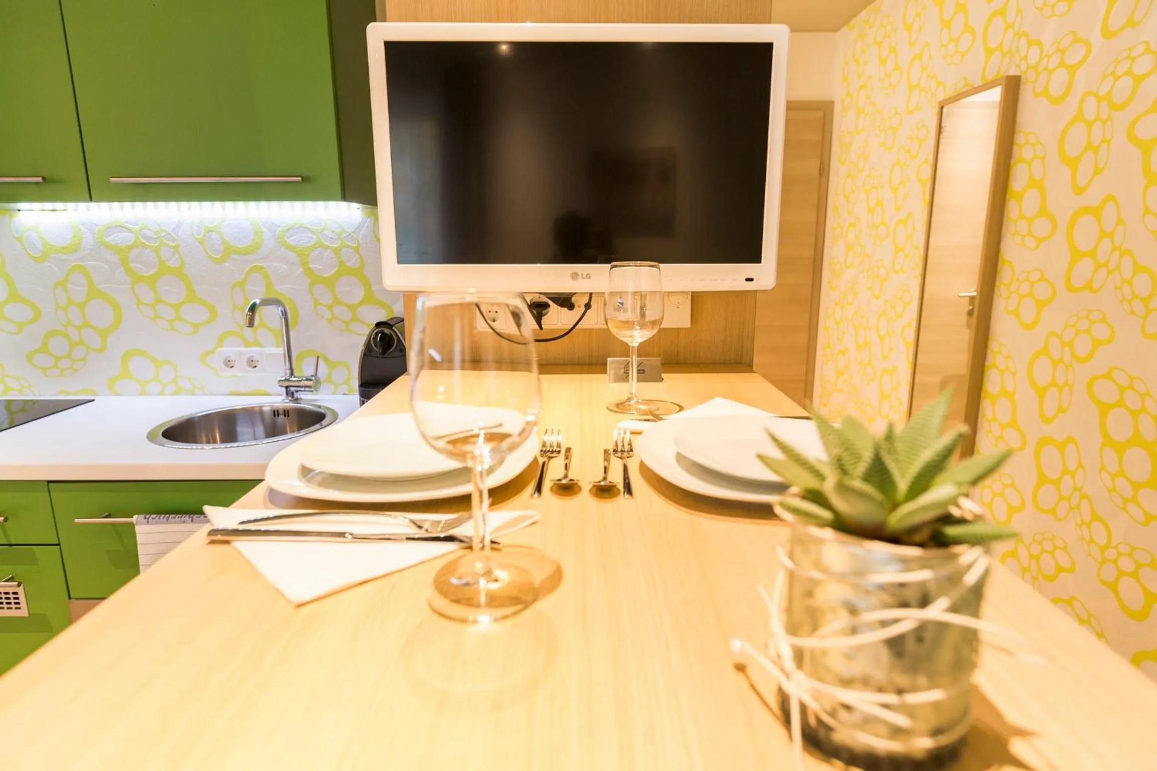 TV and multimedia in Room 4 & 5 Apartments