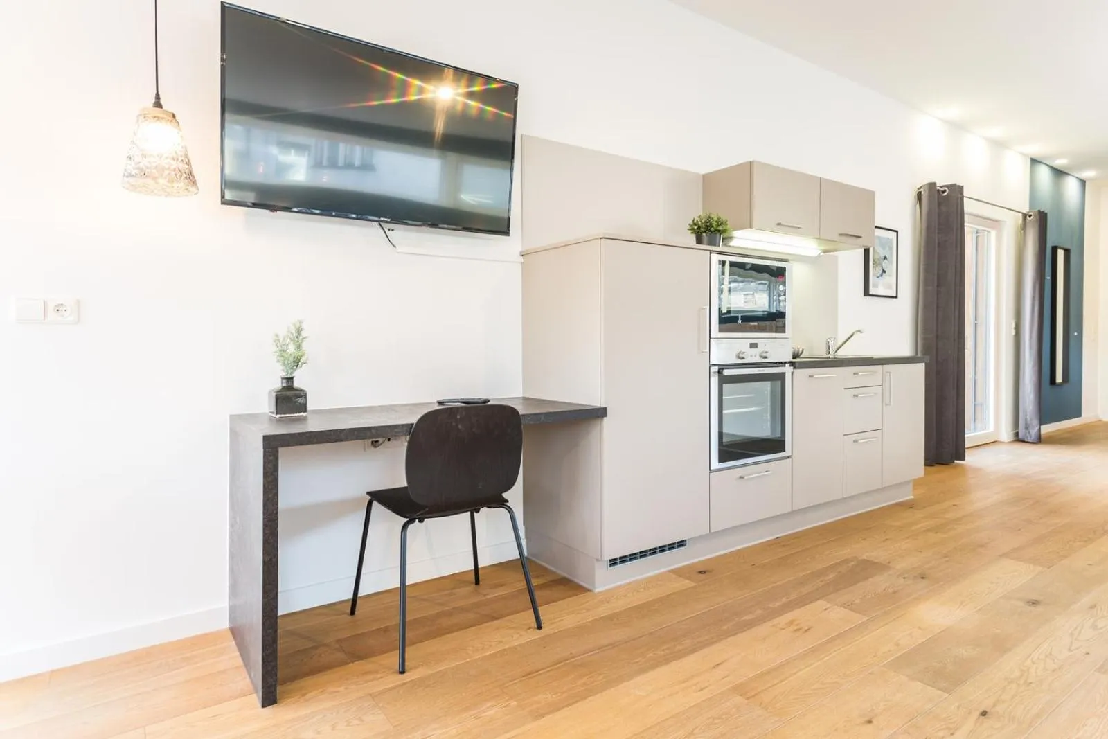 Kitchen or kitchenette in Room 4 & 5 Apartments