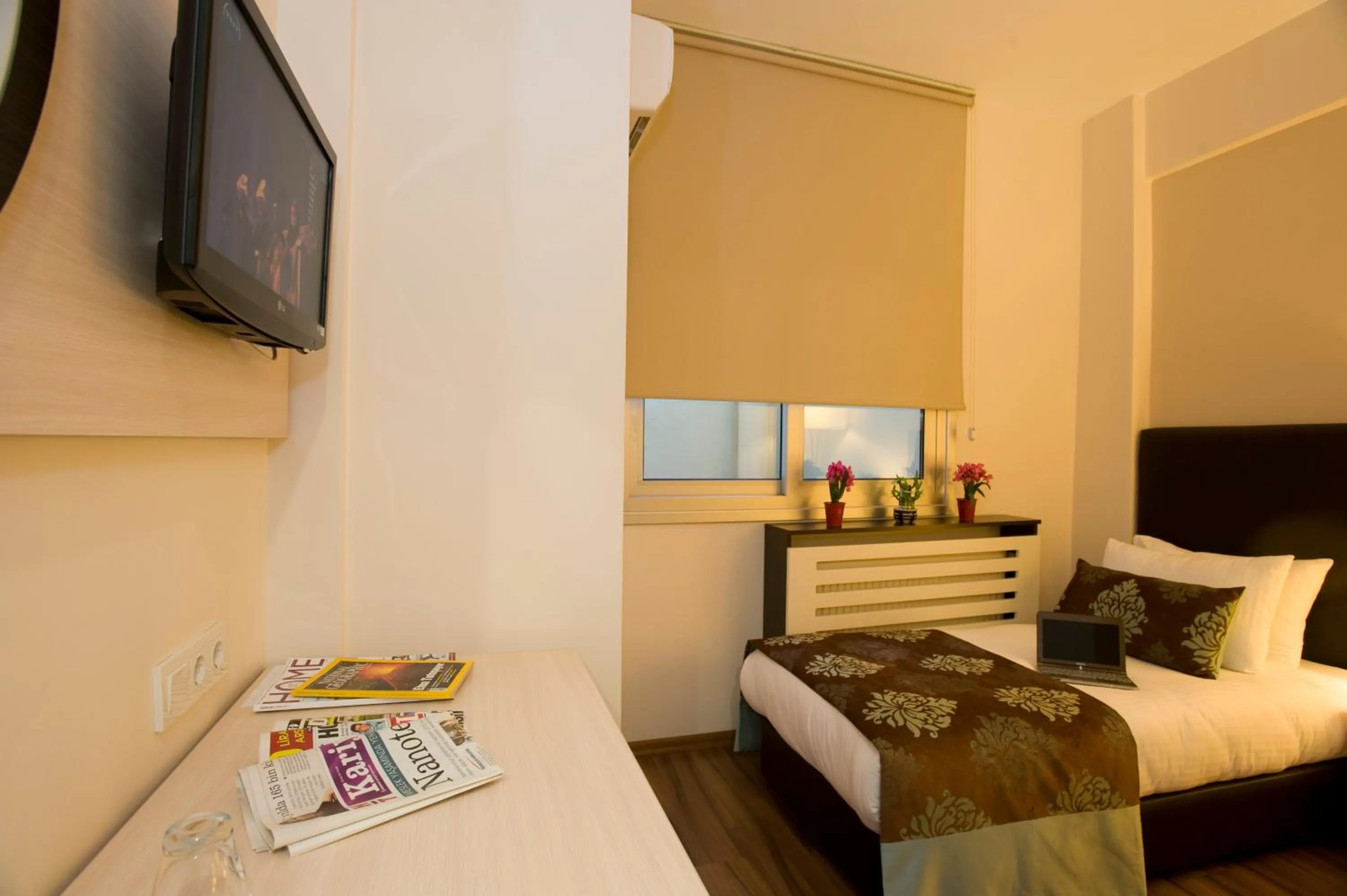 Bed in The New Hotel Zeybek