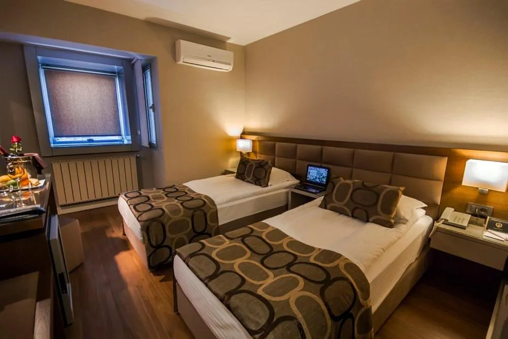 Bed in The New Hotel Zeybek