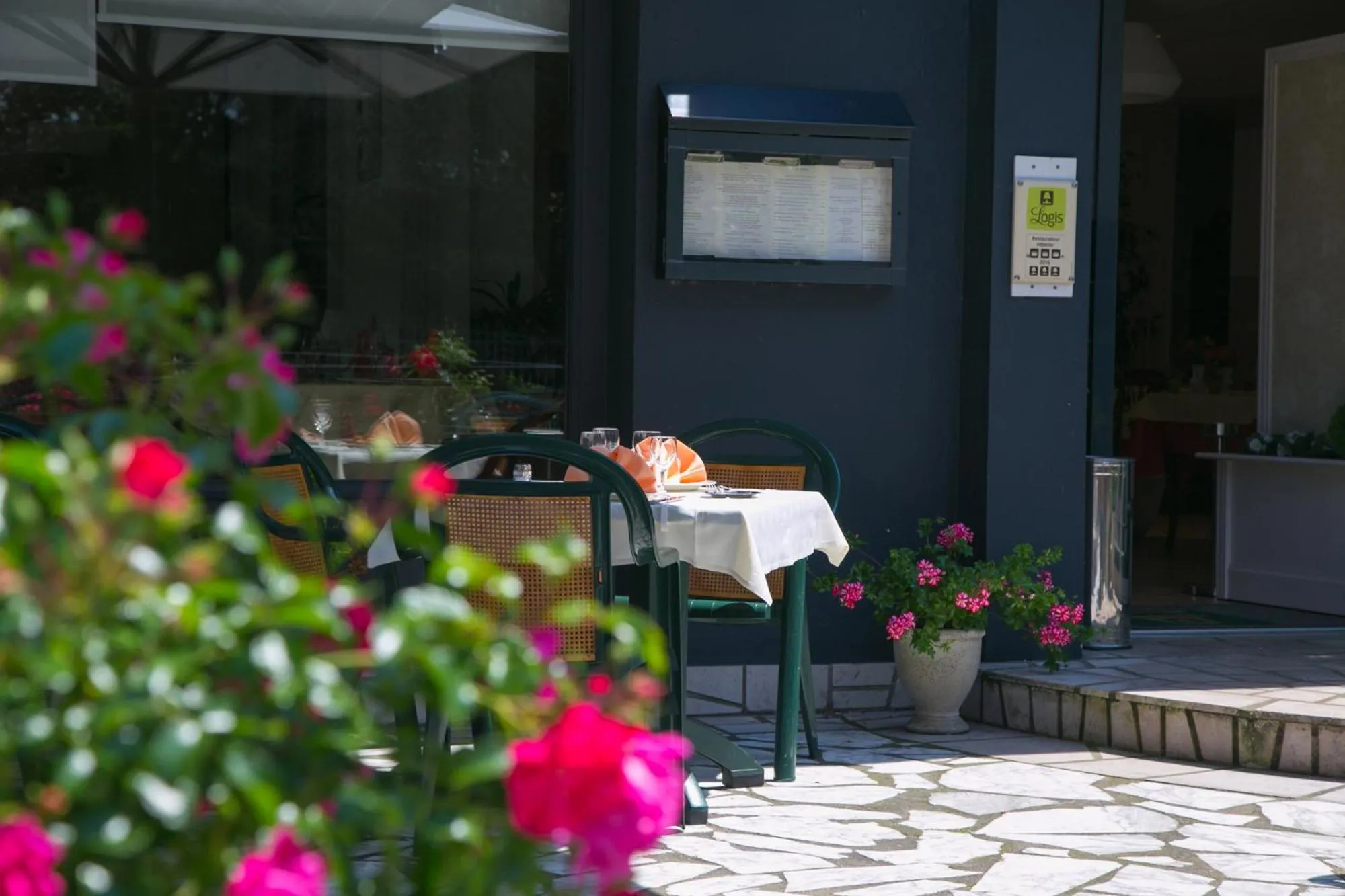 Balcony/Terrace in Logis Hôtel Auberge de la Rose