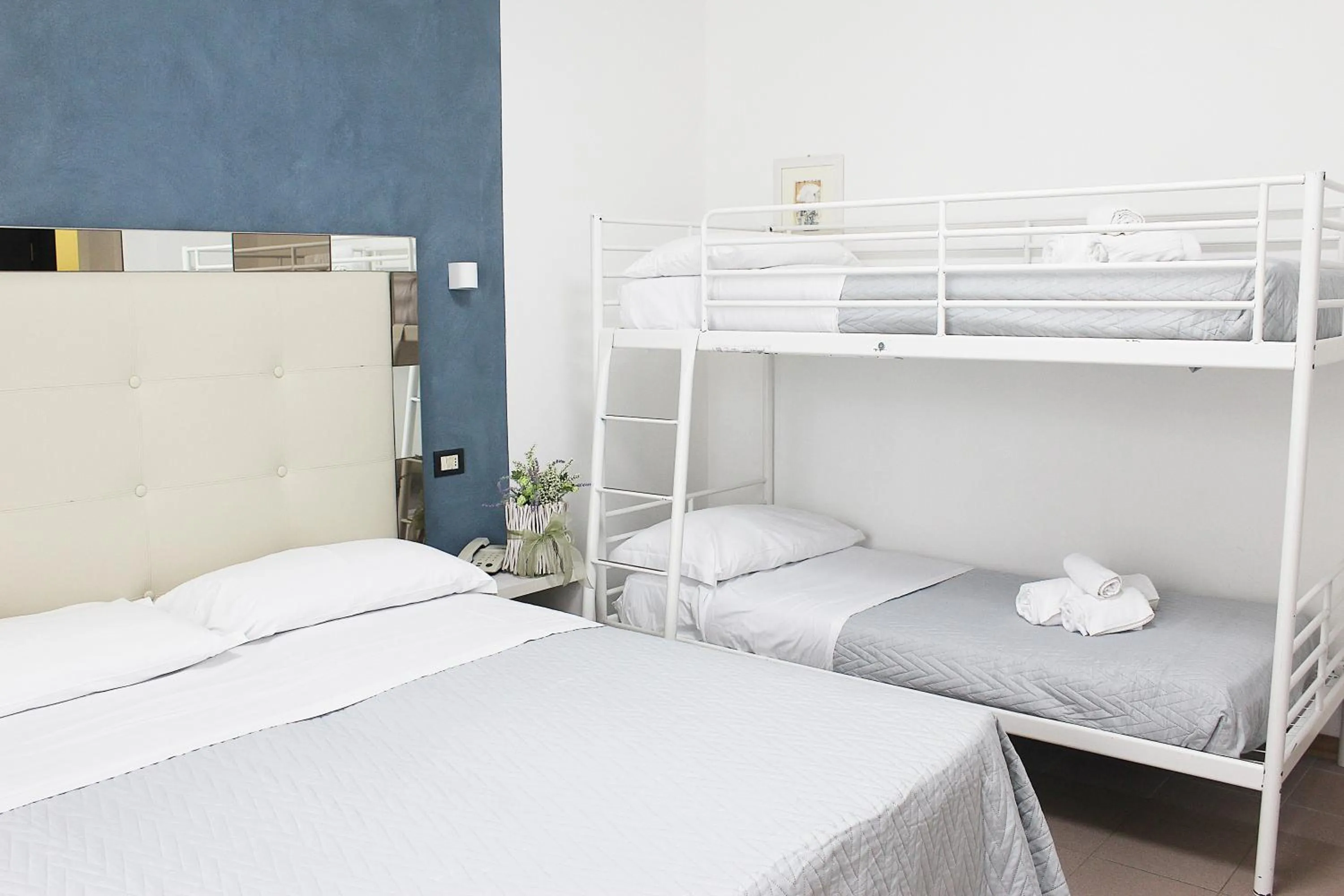 Bed in Hotel Brigantino